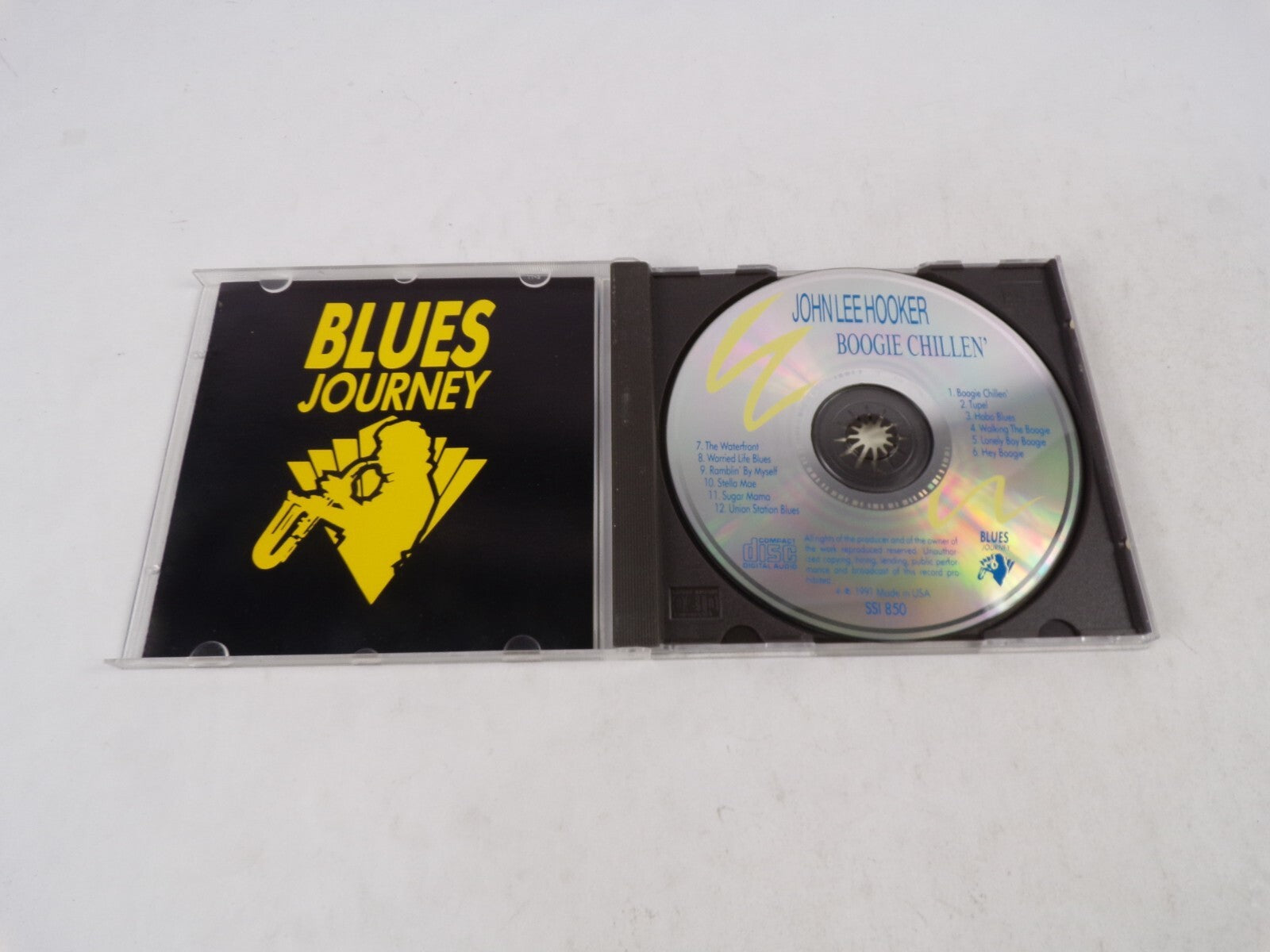 Johnlee Hooker Boogie Chillen Includes Hobo Blues Suhgar Mama CD#34