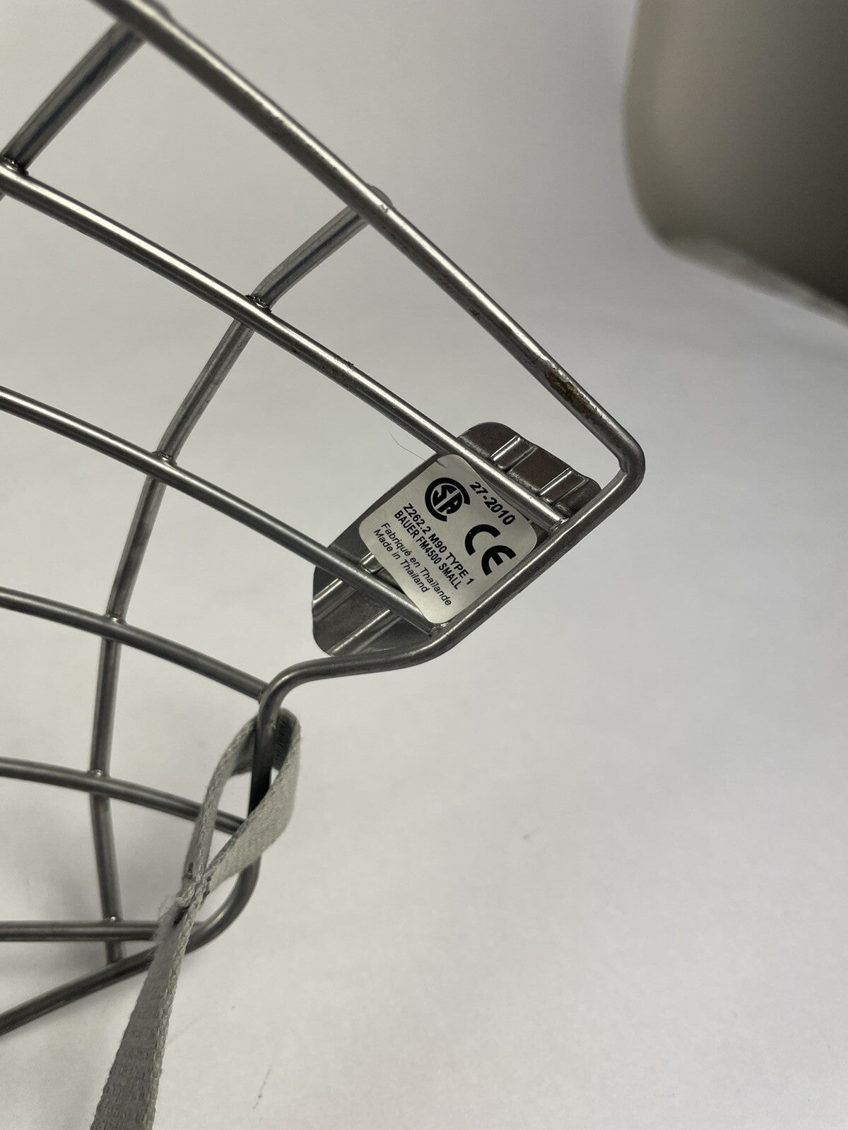 Nike Bauer True Vision II FM4500 small gray hockey cage facemask with chin cup and straps