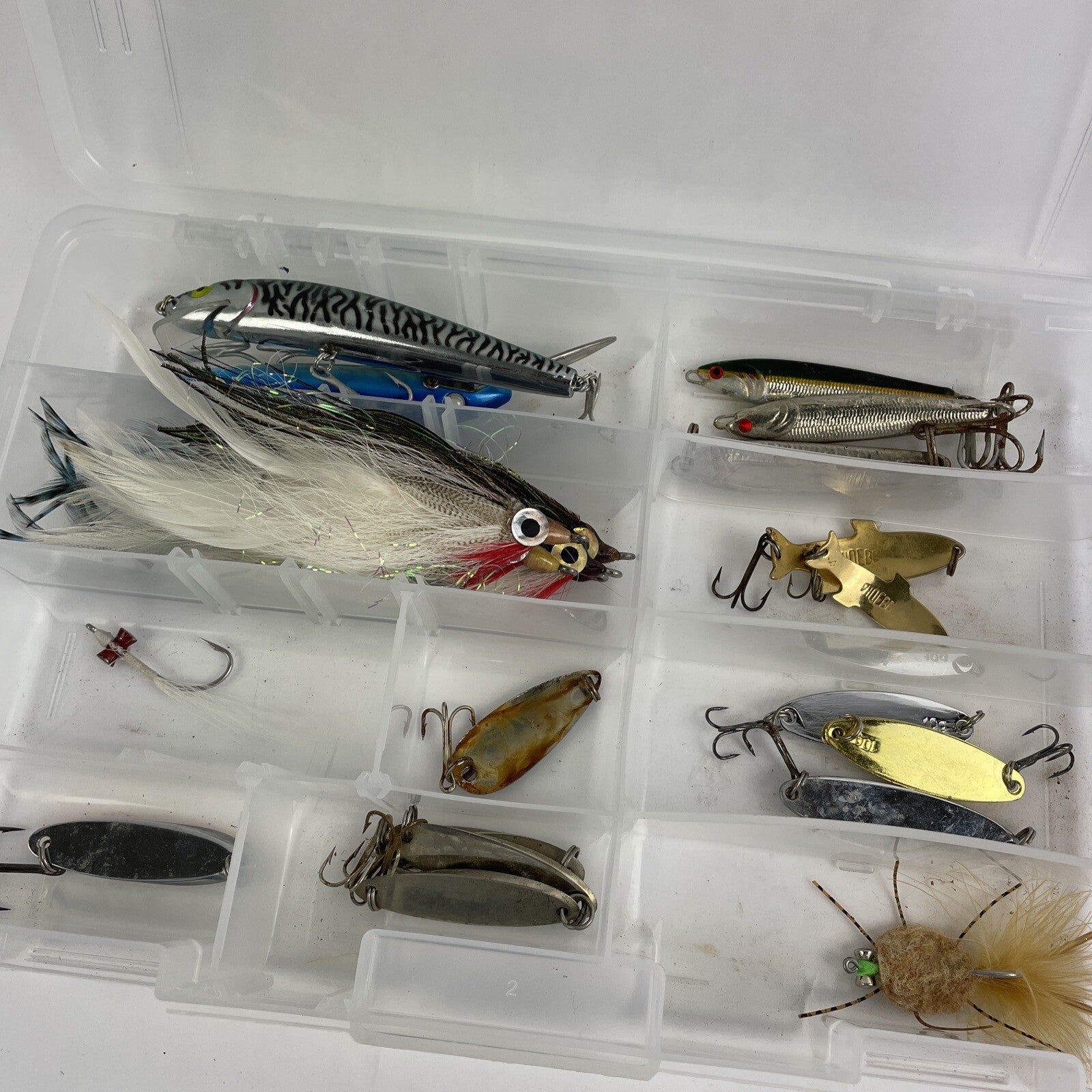 Lot of 22 assorted fishing spoons and spinners including Castmaster, Acme, and Phoebe lures.