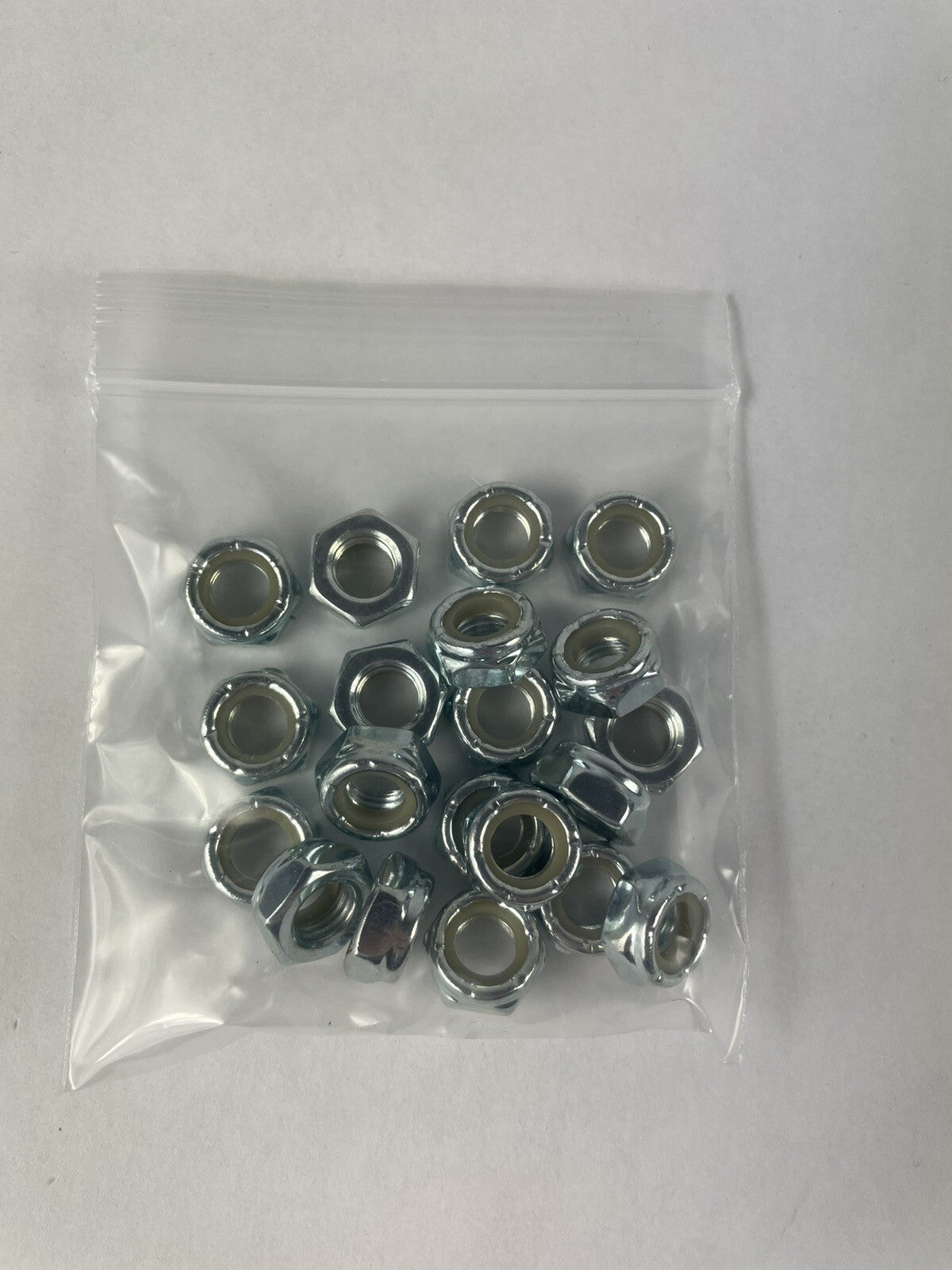 5/16-24 fine thread chrome-plated zinc steel nylon insert lock nuts, 20-piece pack.