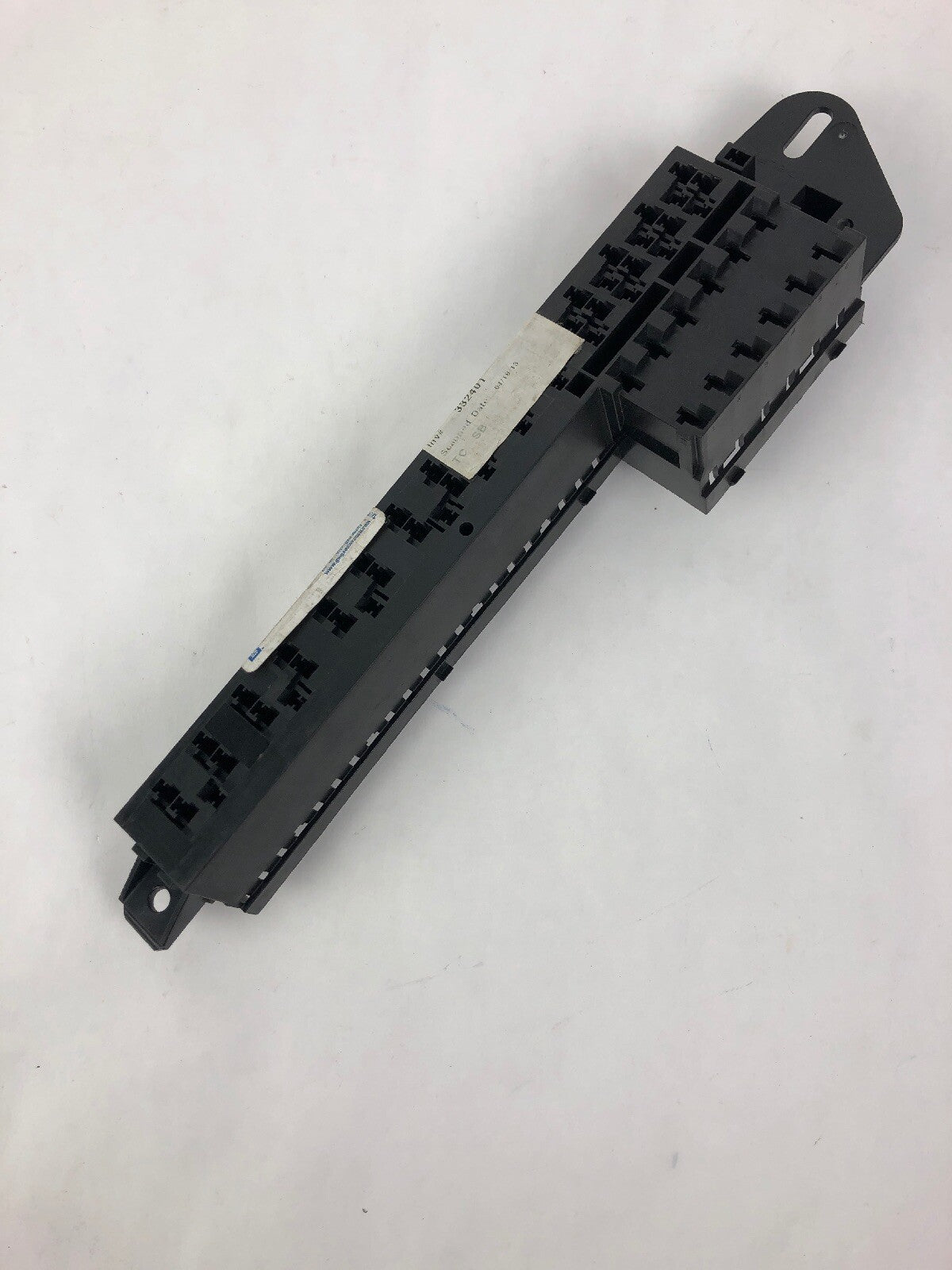 Genuine GM OEM 88956562 engine wiring harness junction fuse block electrical center direct replacement for compatible Chevrolet and Pontiac vehicles.