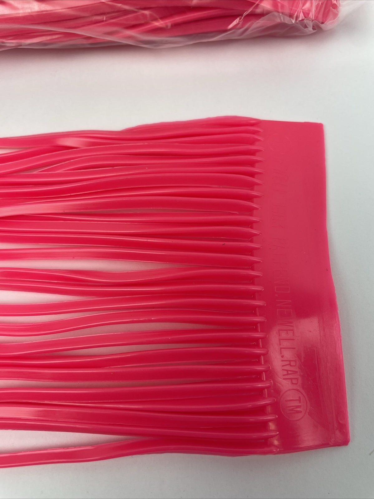 Newell MFG pink offshore trolling fishing skirts 10 pack for tuna and marlin lures.