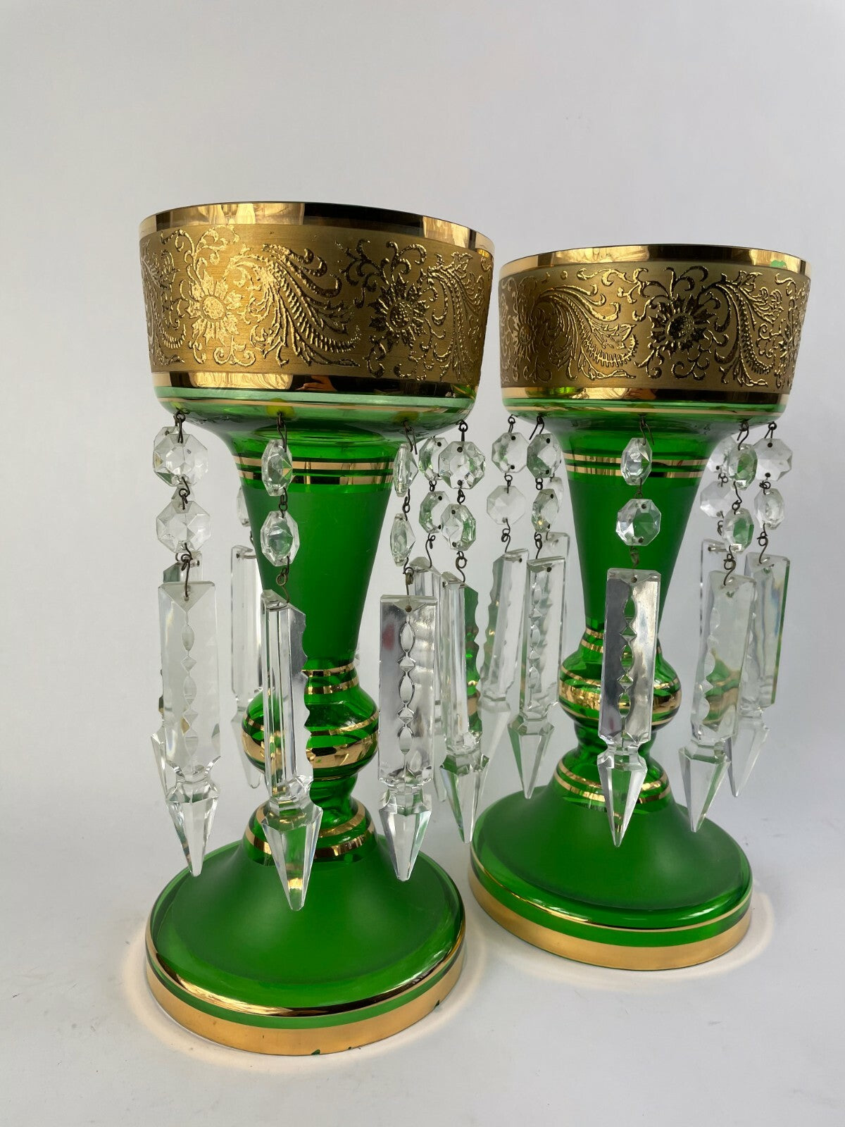 Set of two beautifully designed decorative crafted clear glass display articles.