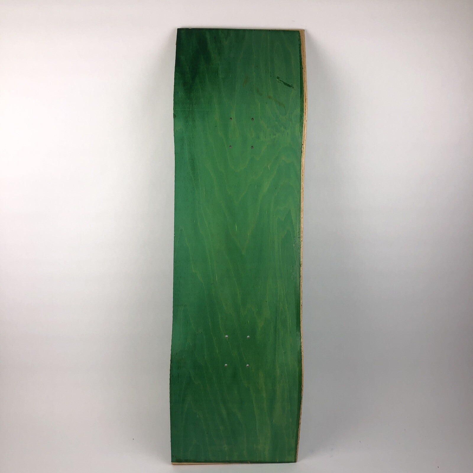 Blank uncut 10 x 34-inch green stain skateboard deck with 14.25-inch wheelbase.