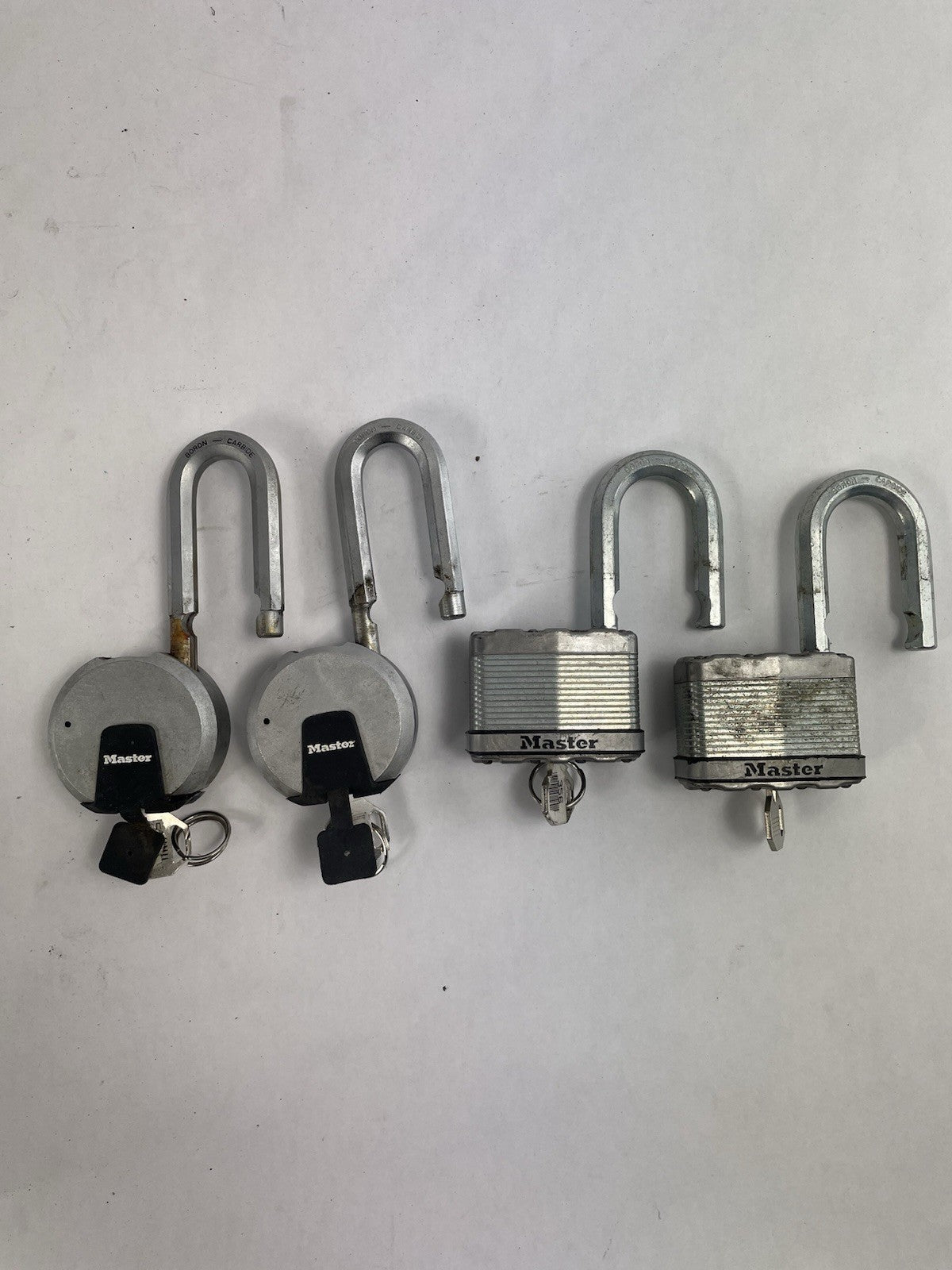 Lot of 4: Master Solid Steel Boron Carbide Contractor Grade Padlock with Keys