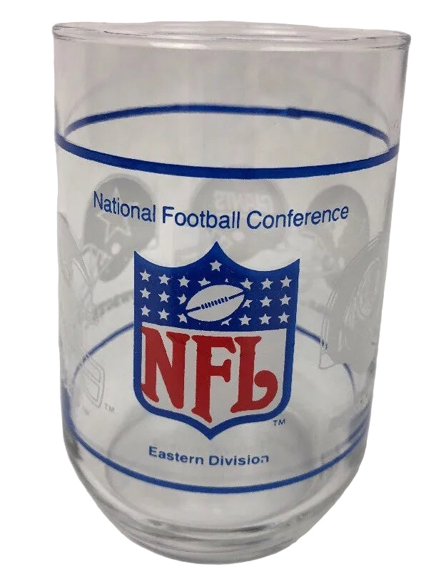 Vintage NFL NFC Eastern Division glass featuring Eagles, Redskins, Cowboys, and Giants.