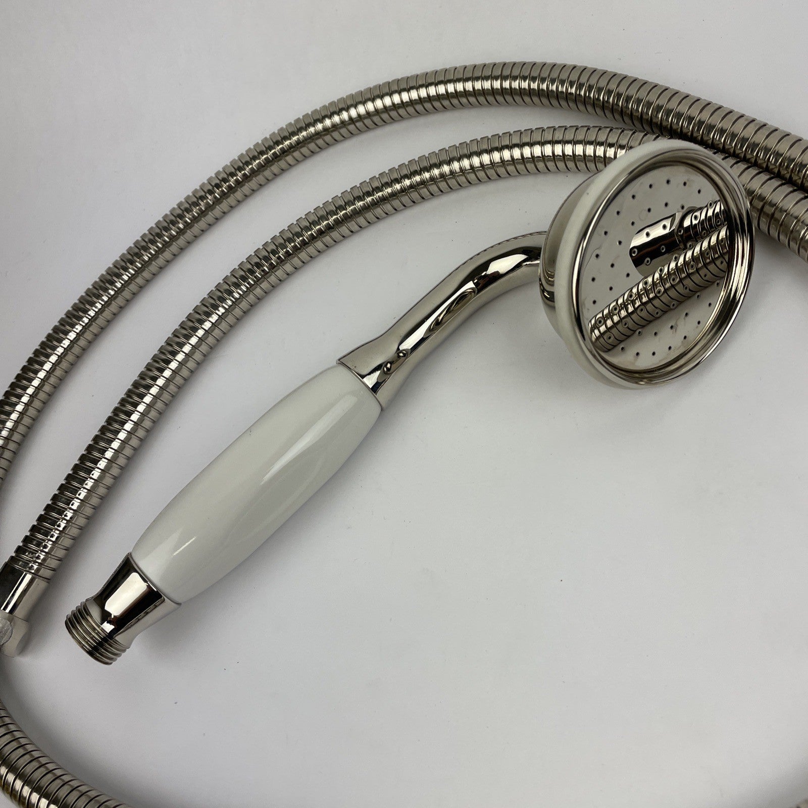 Designer Cooper chrome hand shower with porcelain handle and stainless steel hose