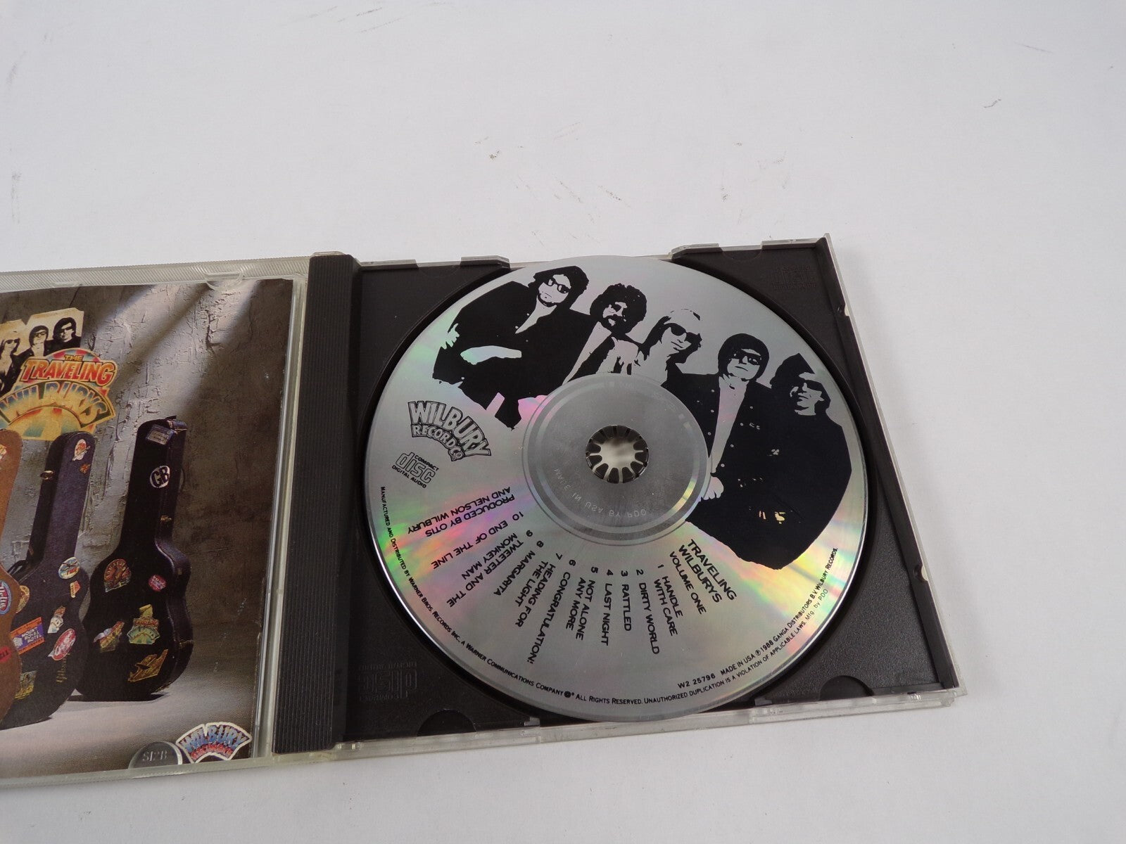 Traveling Wilburys Handle With Care Dirty World Margarita Last Night CD#47
