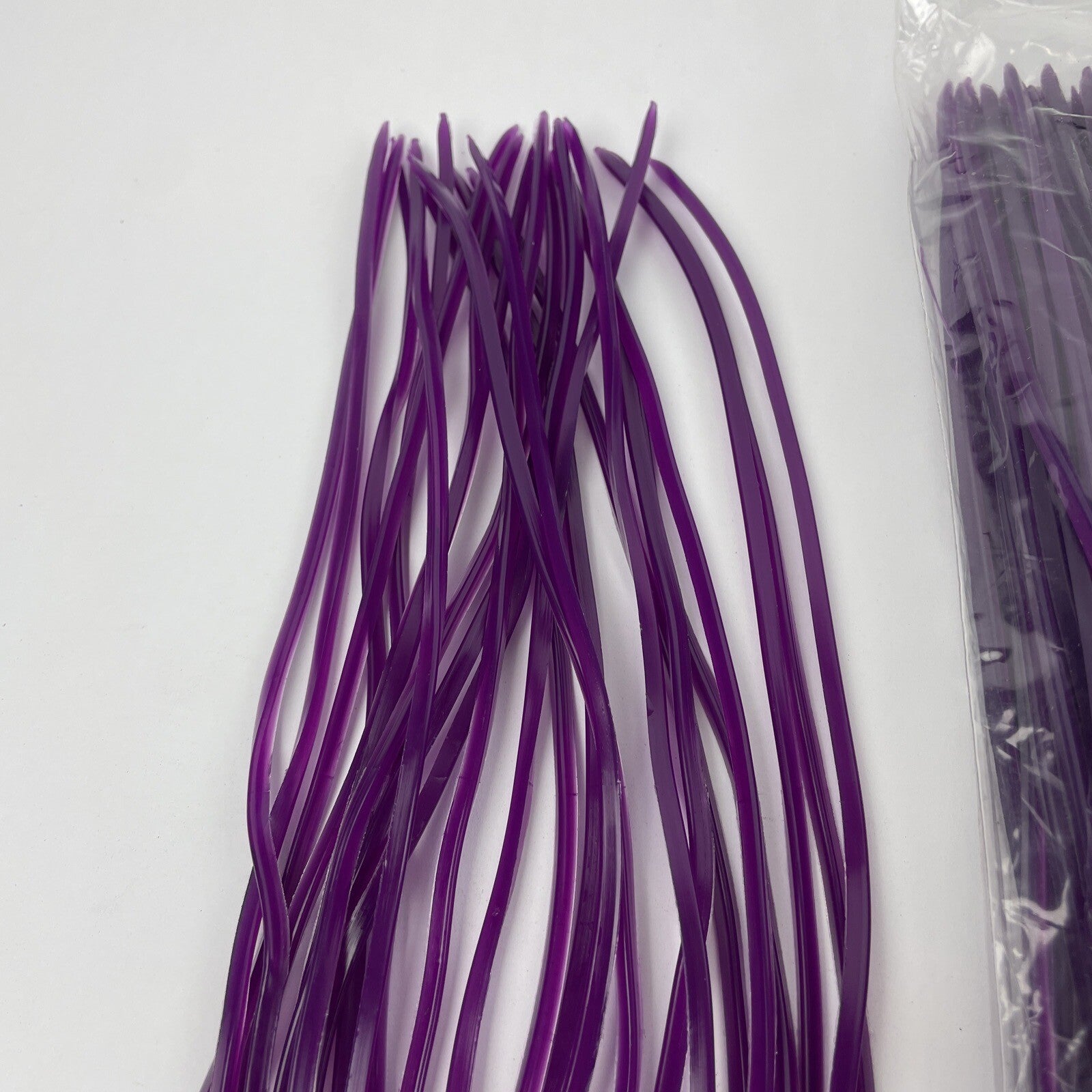 Newell MFG purple offshore trolling fishing skirts 10 pack for tuna and marlin lures.