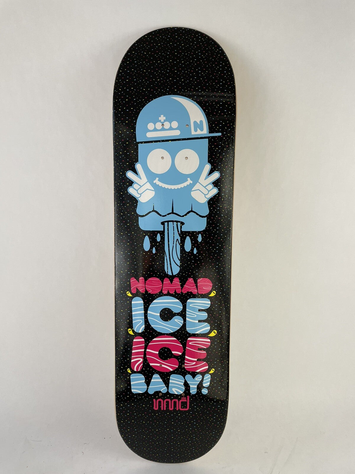 Nomad Skateboards Ice Ice Baby 8.25-inch hard rock maple skateboard deck with grip tape and premium graphic artwork.