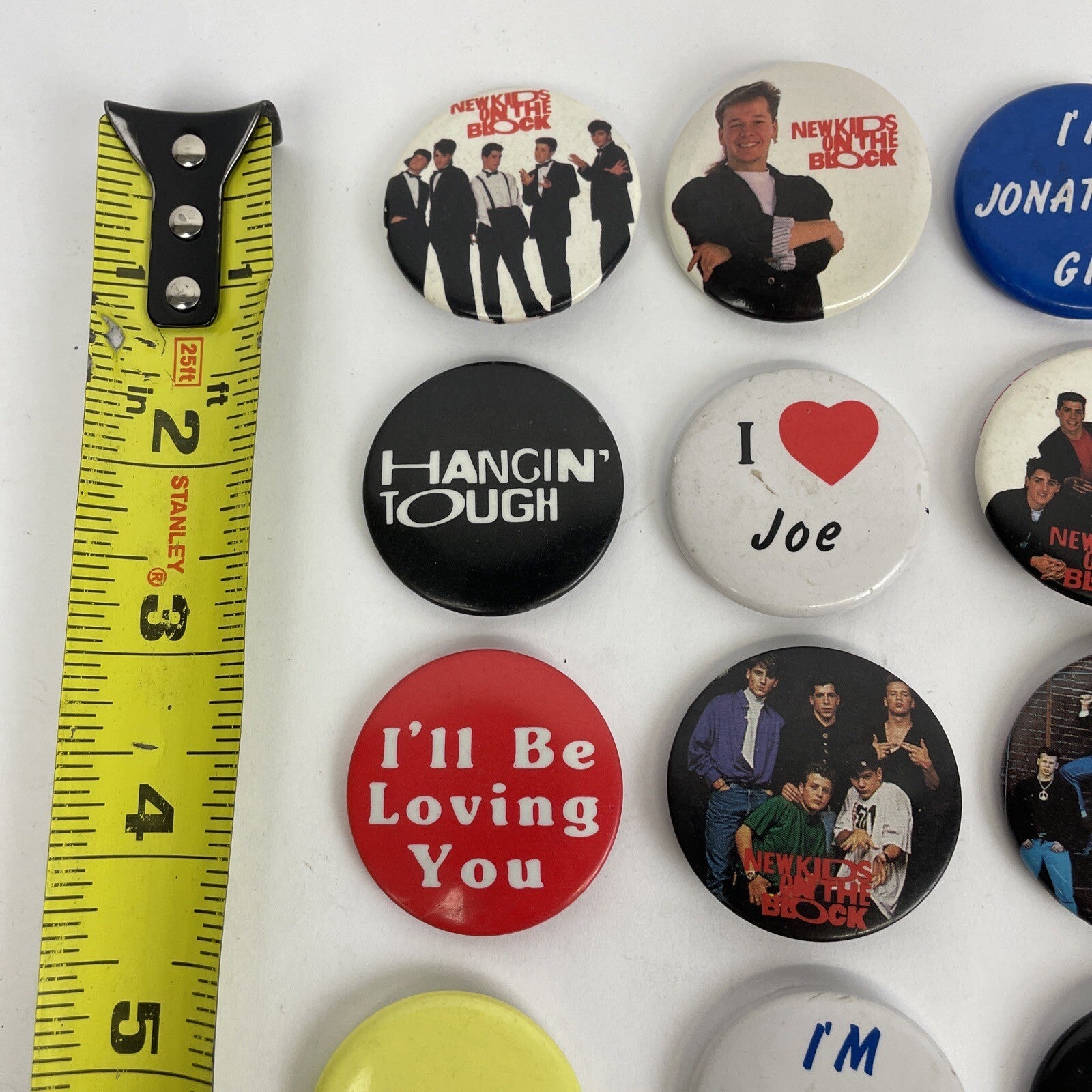 Lot of 45 New Kids On The Block buttons pins keychain and vintage NKOTB collectibles from the 90s and Y2K era