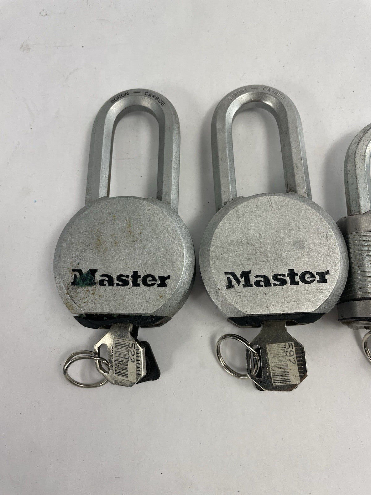 Lot of 4: Master Solid Steel Boron Carbide Contractor Grade Padlock with Keys