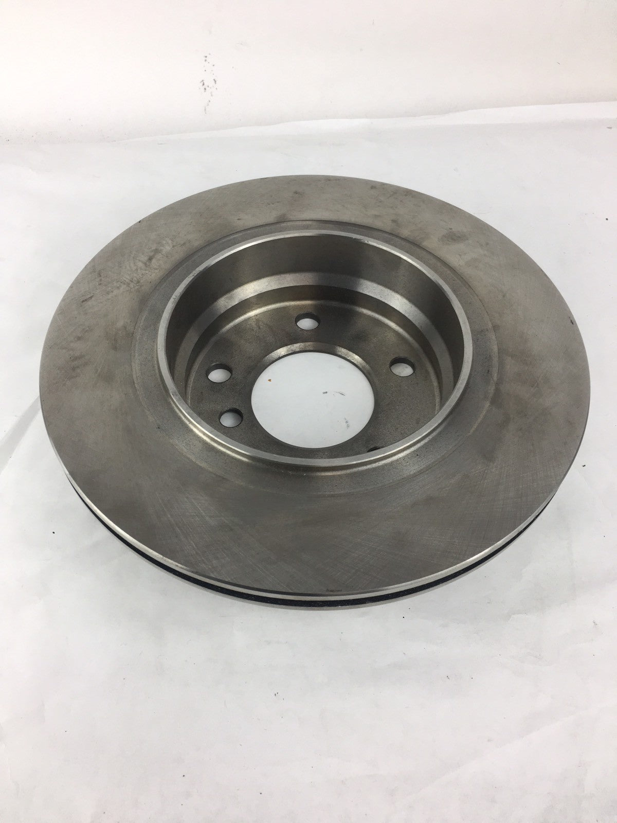 Raybestos 96780R front disc brake rotor vented OEM replacement cast iron 11.25 inch automotive brake rotor for front axle.