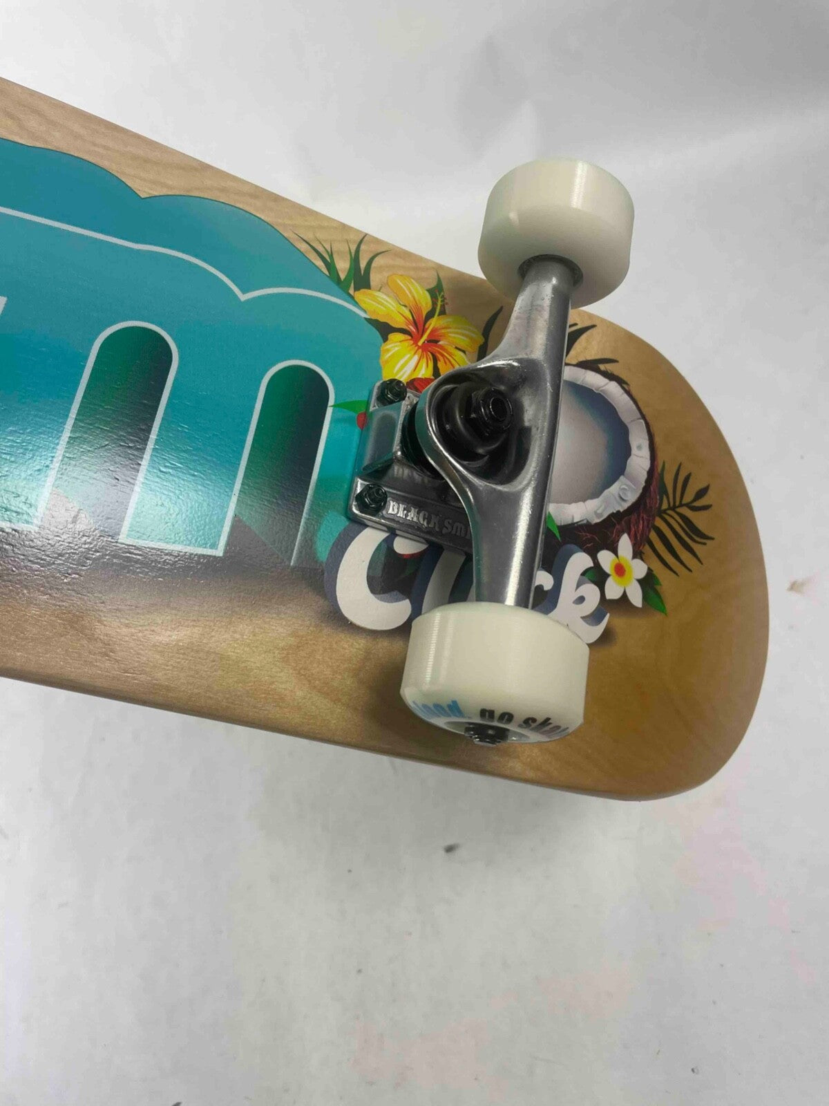 ATM Click Jungle Juice 7.75-inch complete skateboard with Black Smith trucks and 52mm wheels.