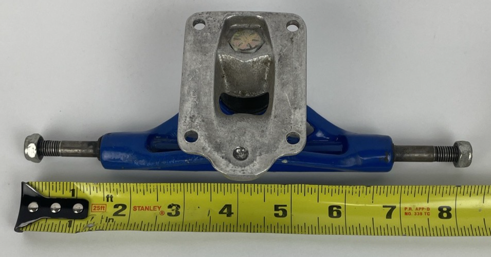 Vintage 1990s Webb Company USA blue single 8-inch skateboard truck.