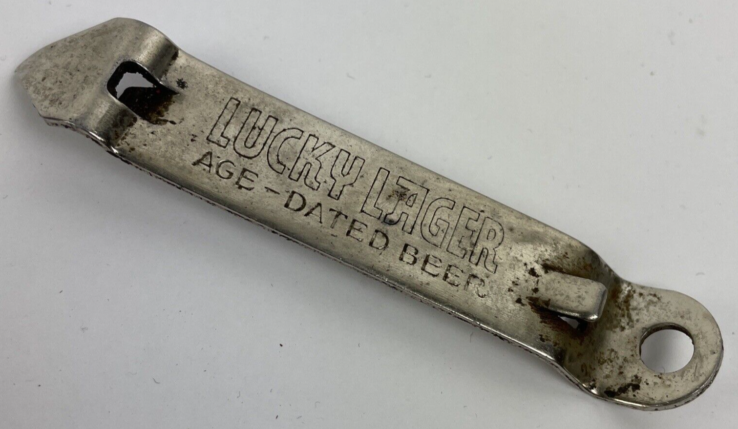 Vintage Lucky Lager Can Beer Bottle Opener "IT'S LUCKY When You Live in America"