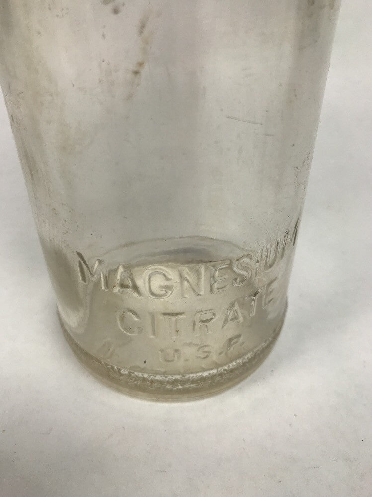 Vintage magnesium sulphate clear glass bottle embossed Registered Not To Be Refilled.