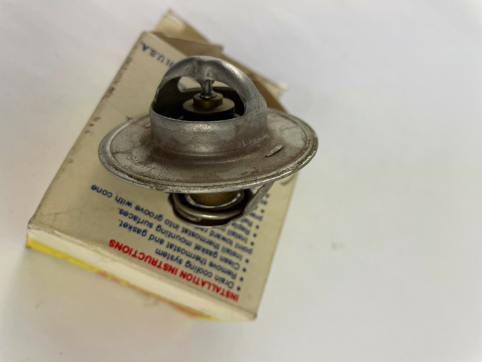 Genuine Stant S330-180 180°F engine coolant thermostat OEM replacement for automotive cooling system A2.