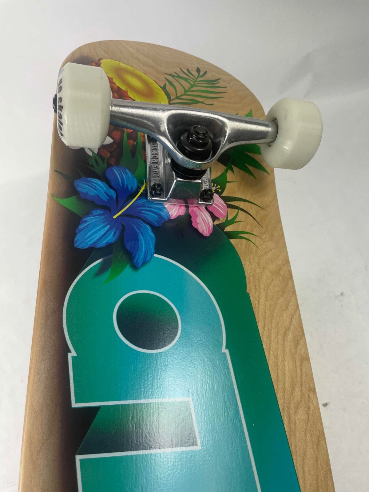 ATM Click Jungle Juice 7.75-inch complete skateboard with Black Smith trucks and 52mm wheels.