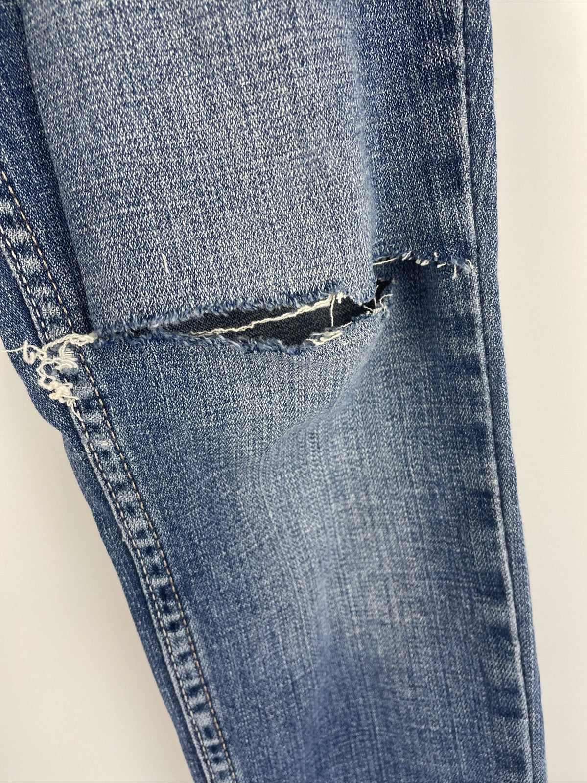 Levis 524 Too Superlow Jeans Women's Size 0M Light Wash Stretch - Worn Tattered