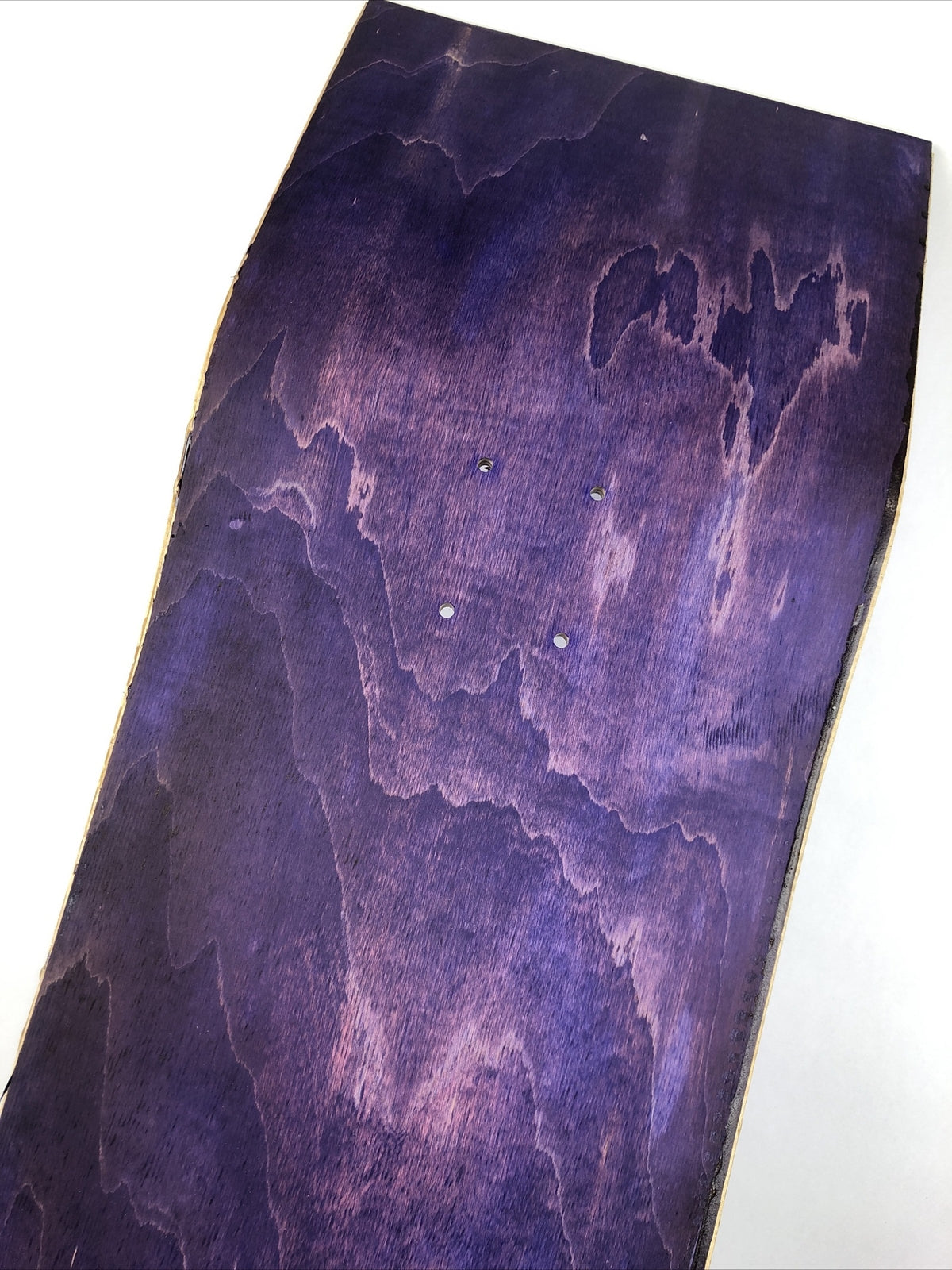 Blank uncut purple stain skateboard deck 10 x 34 inches with 14.25-inch pre-drilled wheelbase.