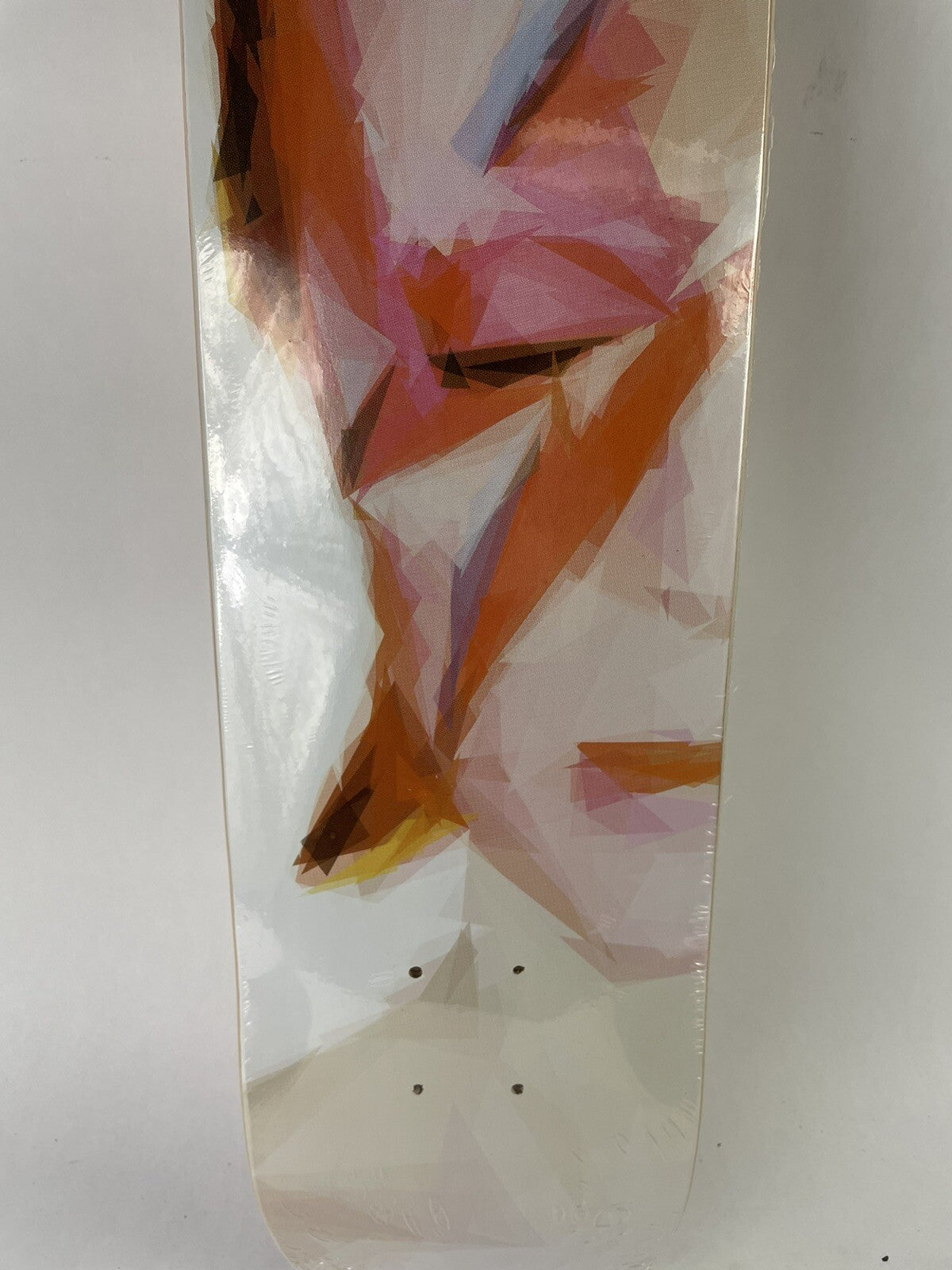Rare new 7.75-inch David Bowie art skateboard deck with collectible graphic on durable 7-ply maple construction.