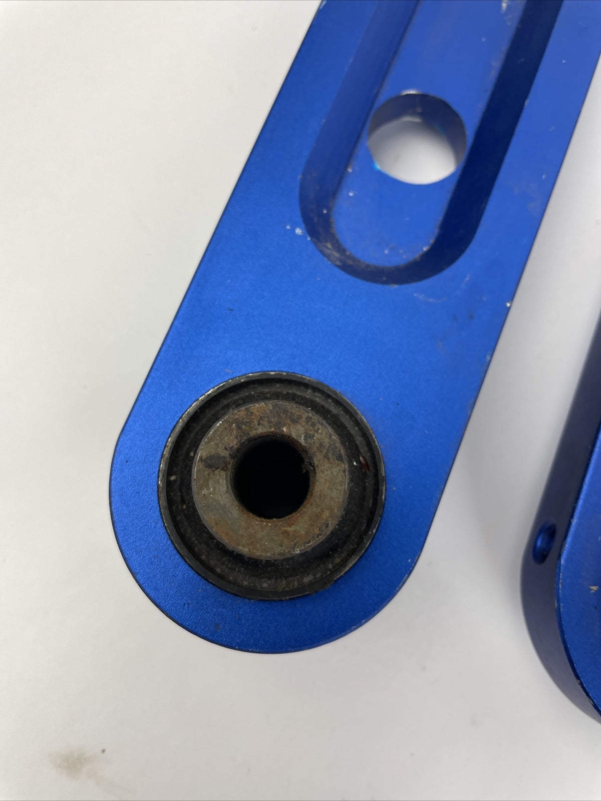 Megan Racing rear control arm bar blue