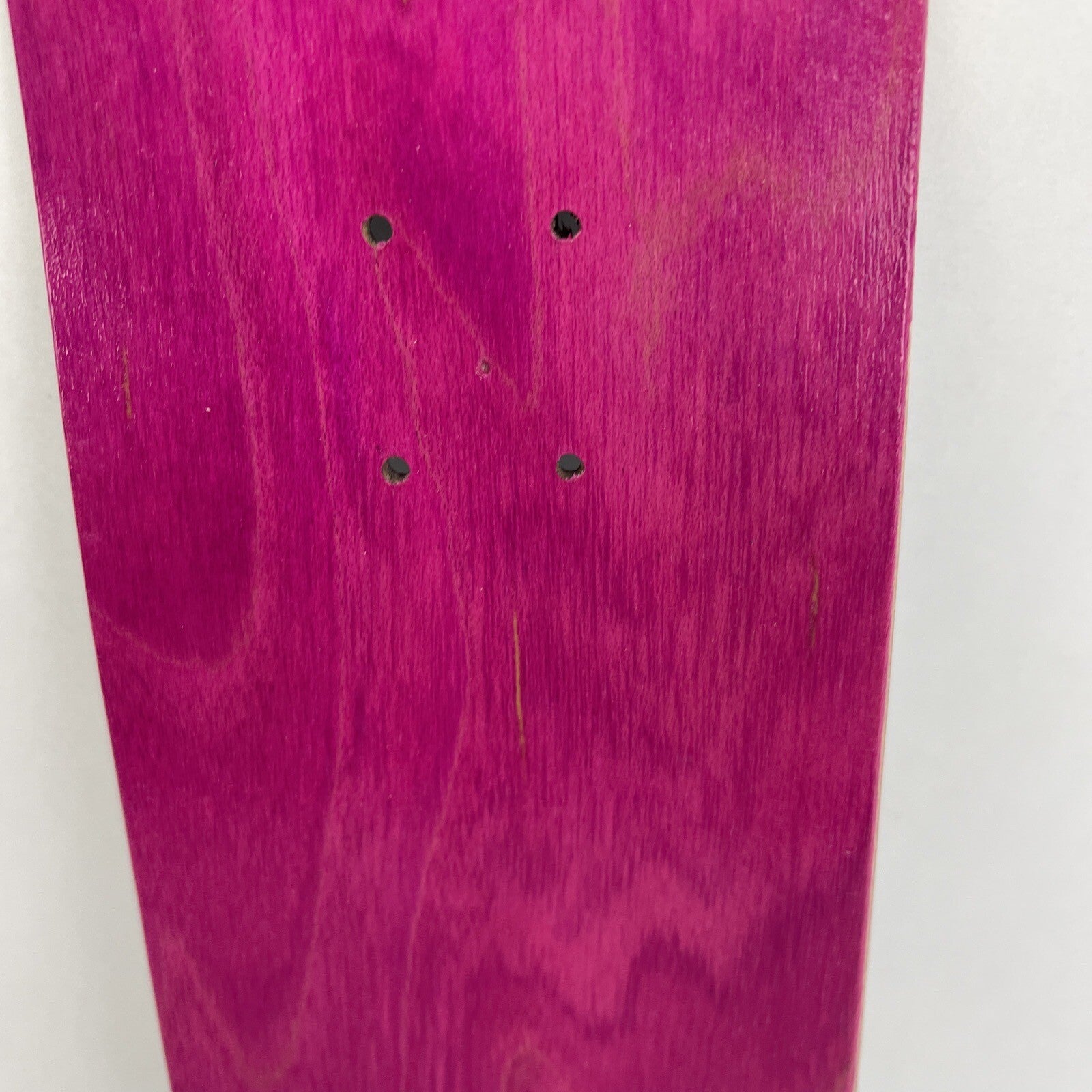 Blank Canadian maple miniature finger skateboard deck measuring 10.5 cm by 2.75 cm with 4.25 cm wheelbase.