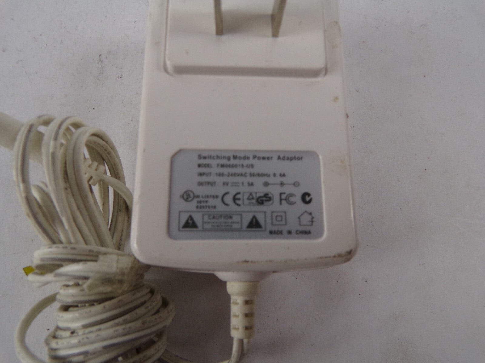 Genuine SwitchingModePowerAdaptorFM060015 Output6V 1.5A Power Supply Adapter A55