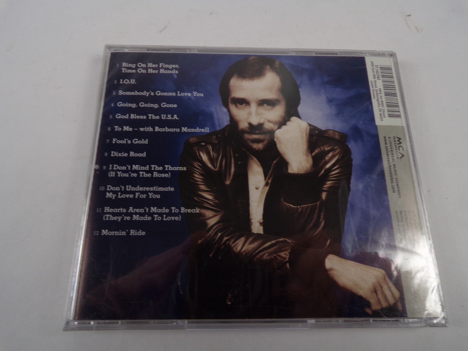 The best of lee greenwood the millennium collection ring on her finger  CD#62