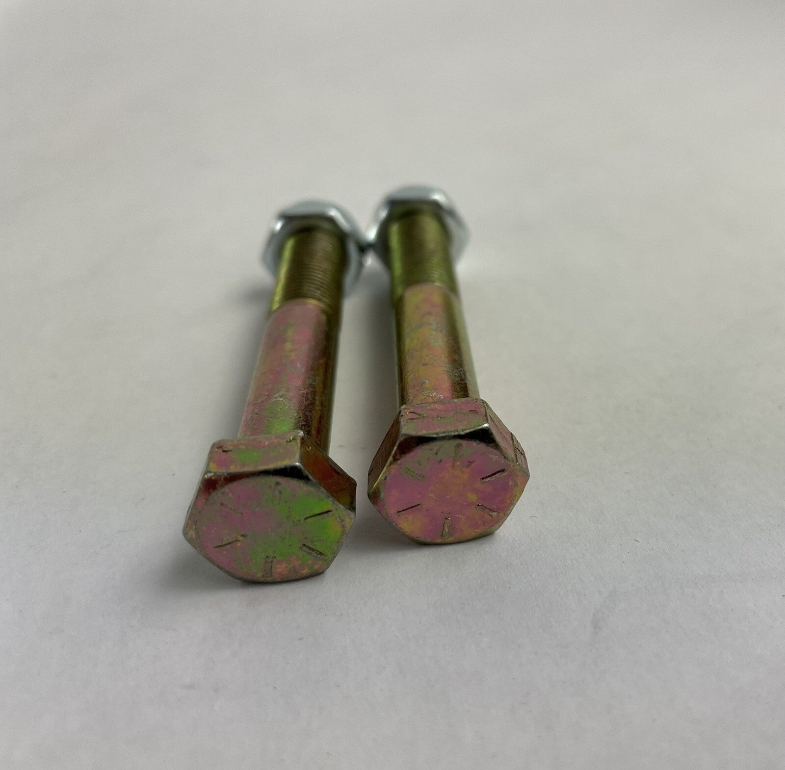 Grind King 2.5-inch skateboard and longboard kingpins with nylon locking nuts, set of two.