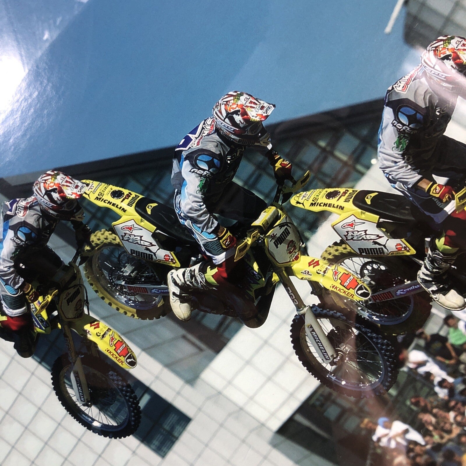 Travis Pastrana signed framed No Fear backflip poster measuring 42.5 by 30.5 inches.