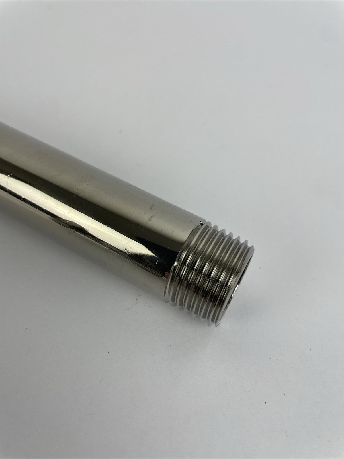 Kohler polished nickel 6 inch shower head with 10 inch shower arm
