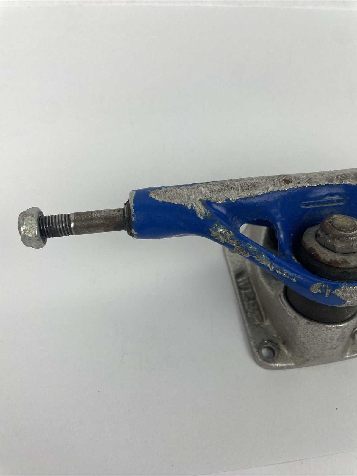 Vintage 1990s Webb Company USA blue single 8-inch skateboard truck.