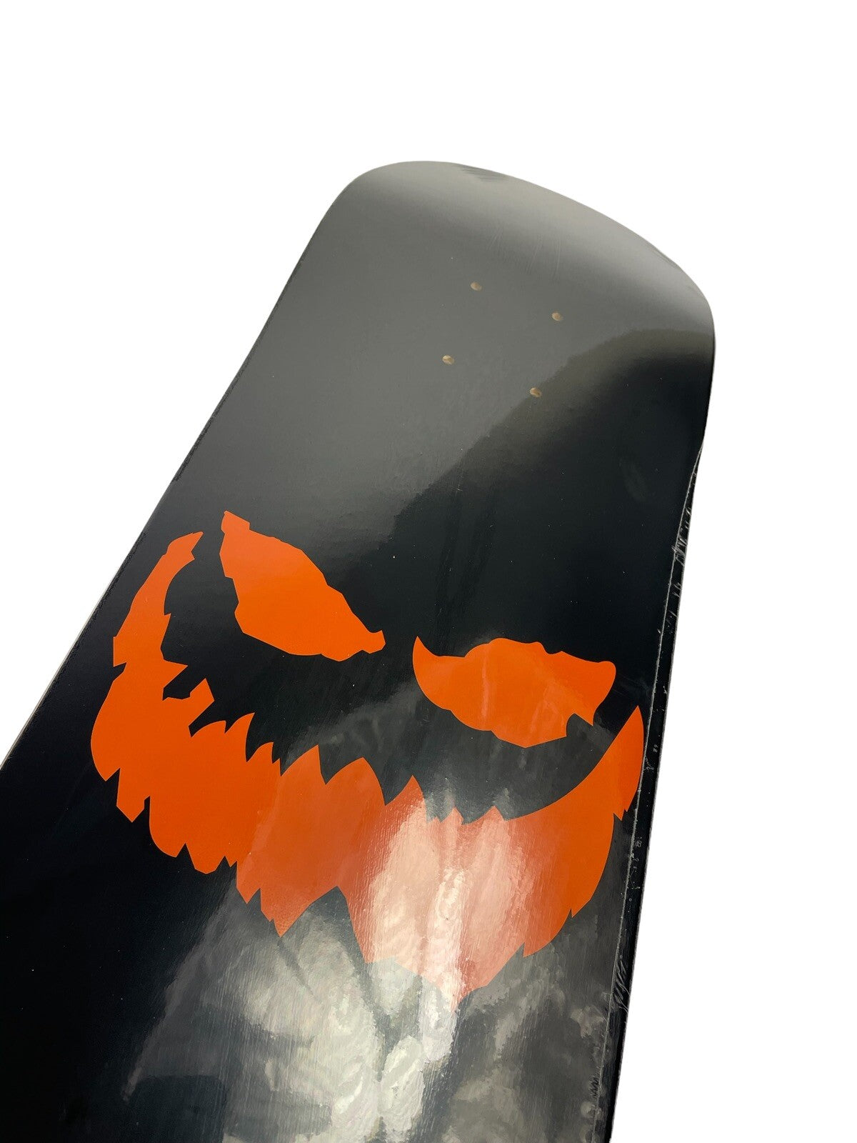 Jack O Lantern Skateboards 8.125-inch black and orange hard rock maple skateboard deck with rare graphic.