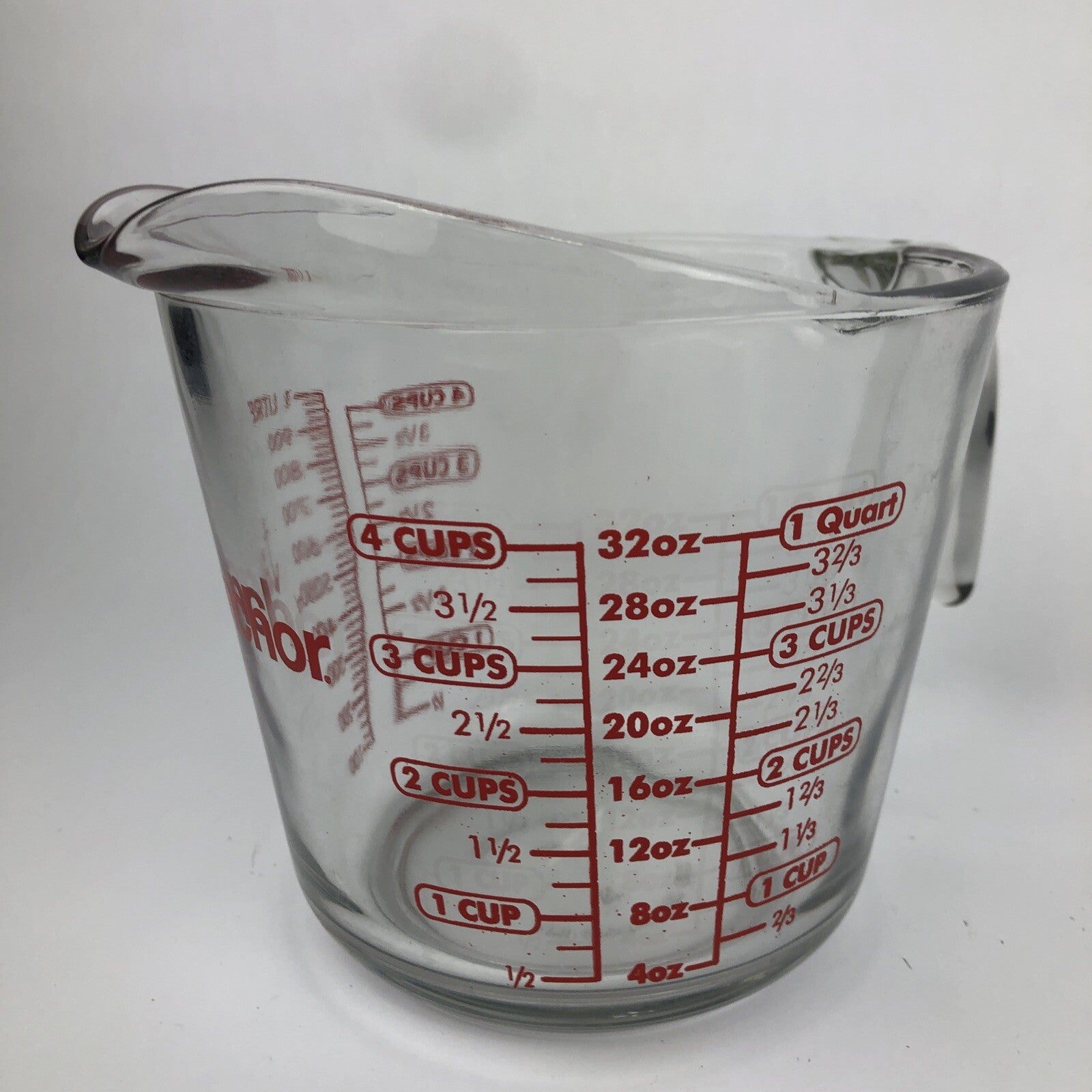 Anchor Hocking USA made 4 cup 1 quart glass measuring cup with red lettering.