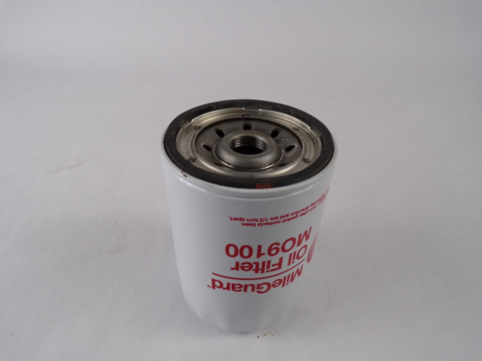MileGuard MO9100 engine oil filter spin-on OEM replacement for Wix 57202 and ACDelco PF2232 automotive engine lubrication system.