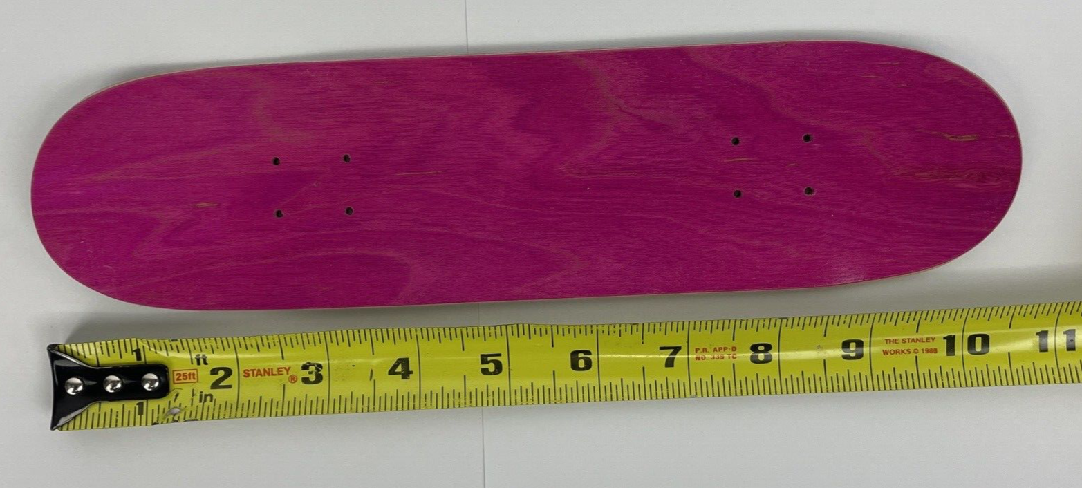 Blank Canadian maple miniature finger skateboard deck measuring 10.5 cm by 2.75 cm with 4.25 cm wheelbase.