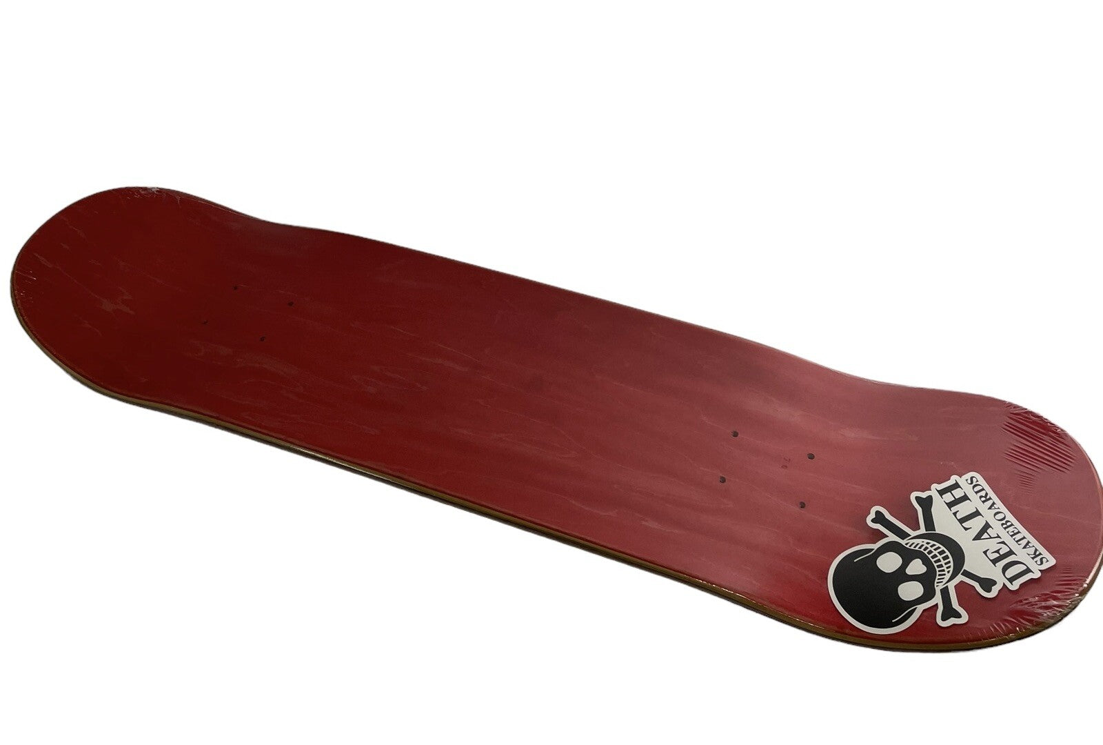 Death Skateboards Dan Cates Jack in the Box Clown Pro red 8.25-inch skateboard deck with grip tape.