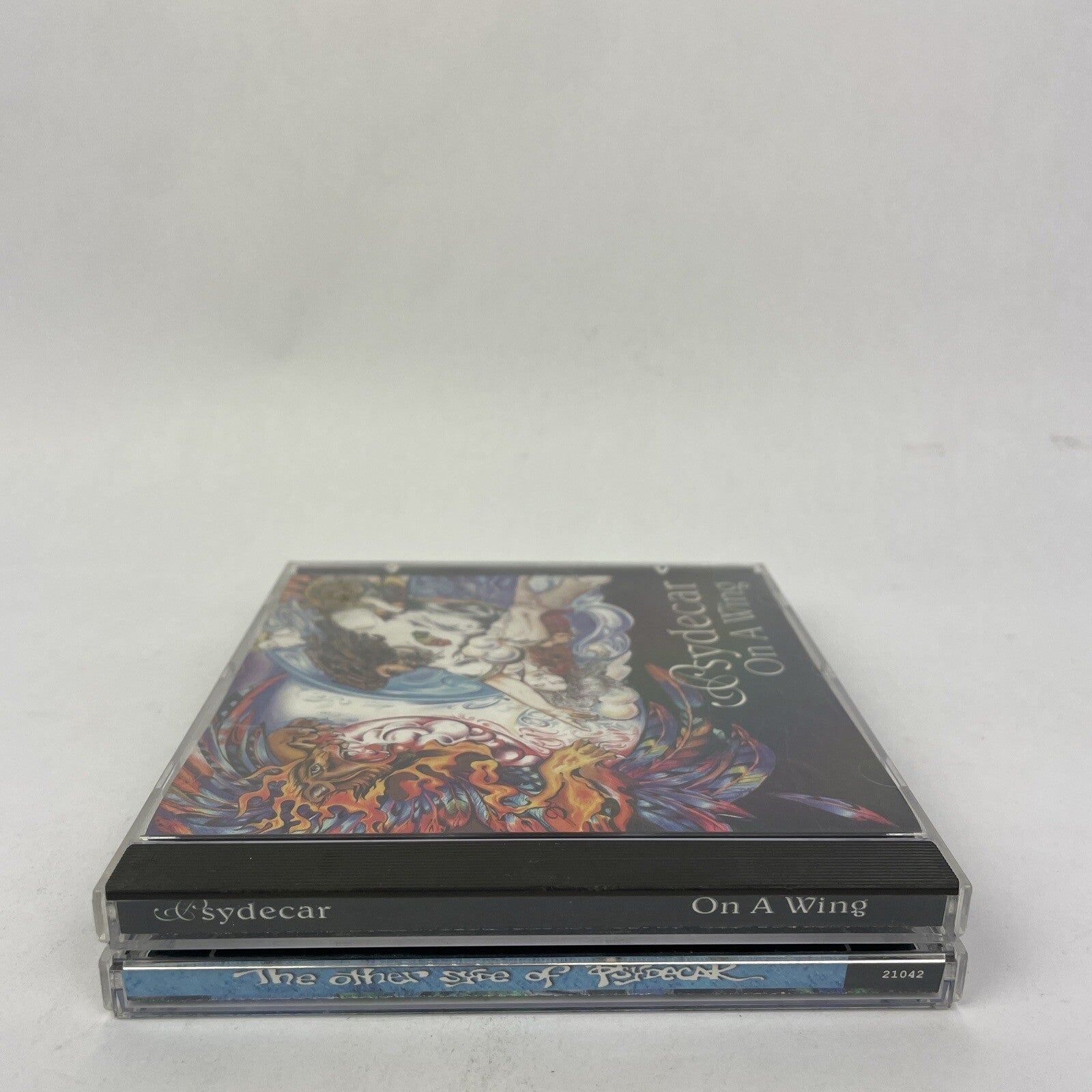 2 x PSYDECAR :  MUSIC DIGITAL AUDIO CD s - The Other Syde Of 2002 - On a Wing 00