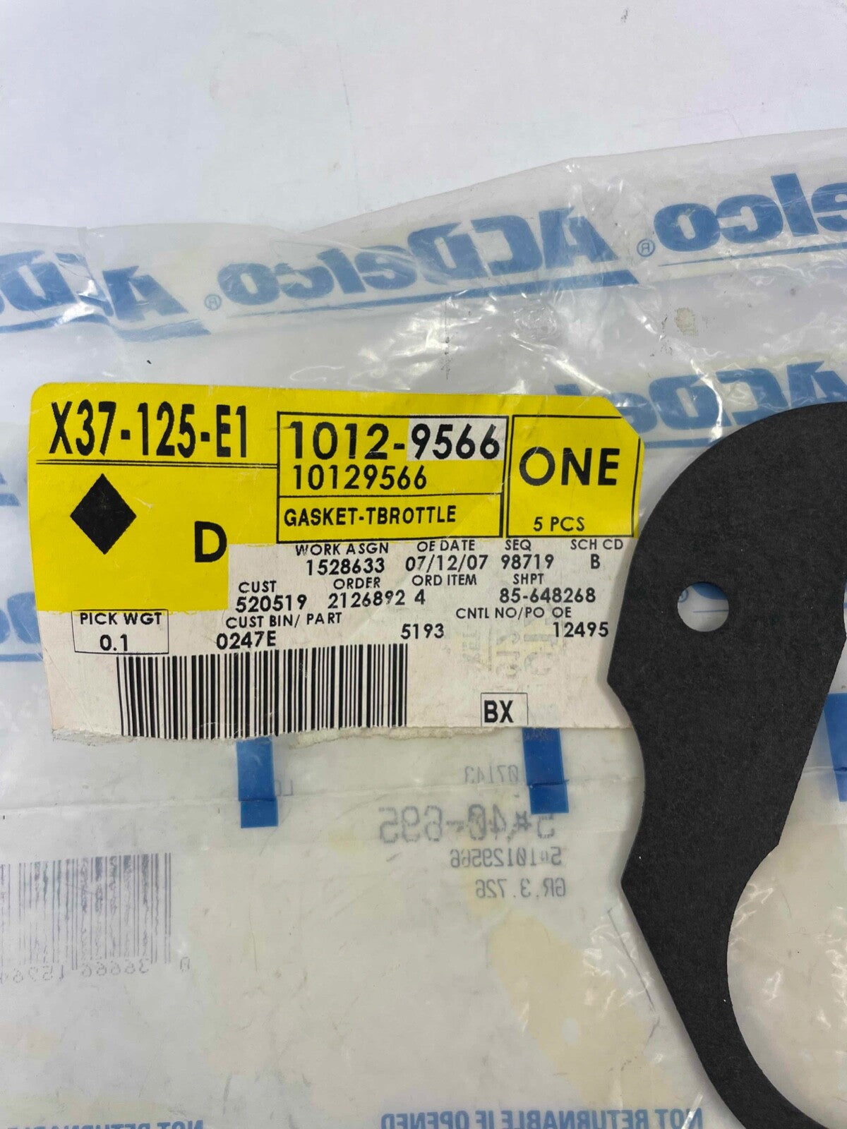 ACDelco 40-695 OEM throttle body mounting gasket GM 10129566 replacement gasket for compatible fuel injection systems.