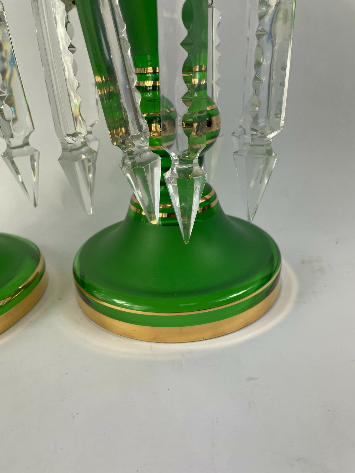 Set of two beautifully designed decorative crafted clear glass display articles.