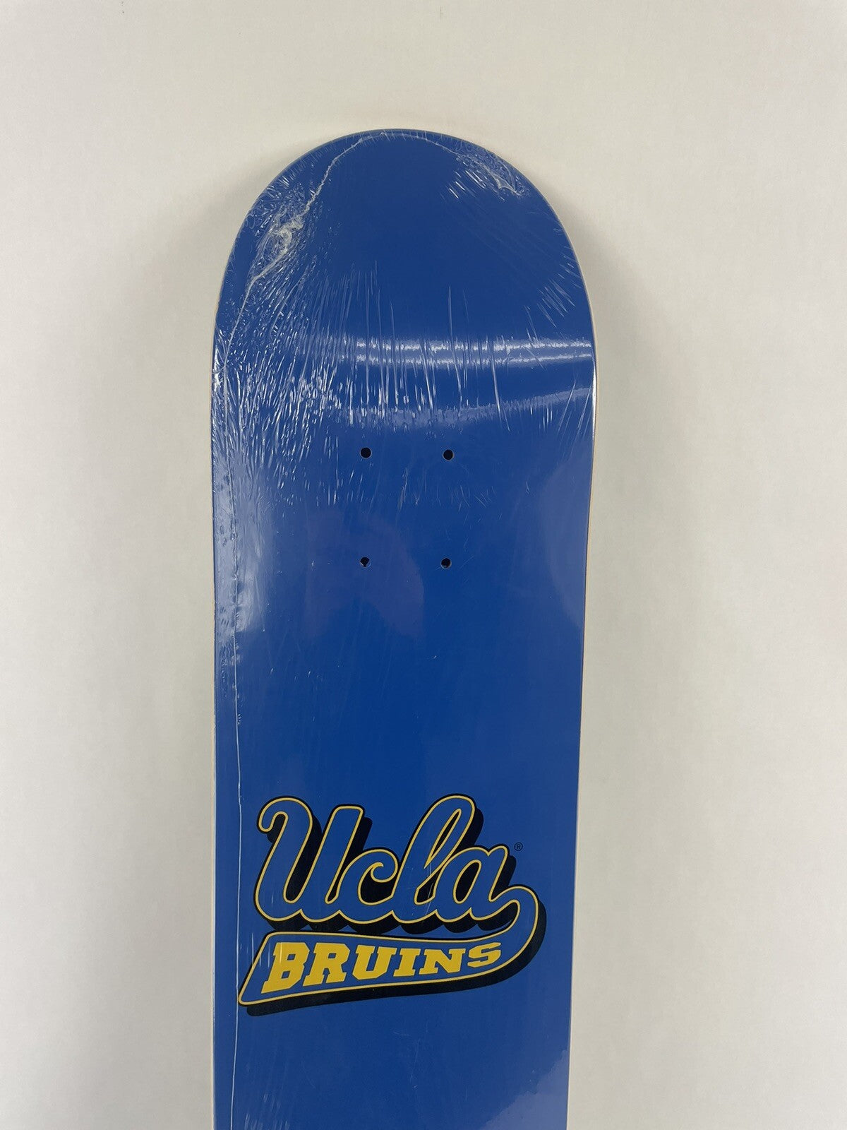 Rare UCLA Bruins 7.5 x 31-inch pre-gripped skateboard deck.
