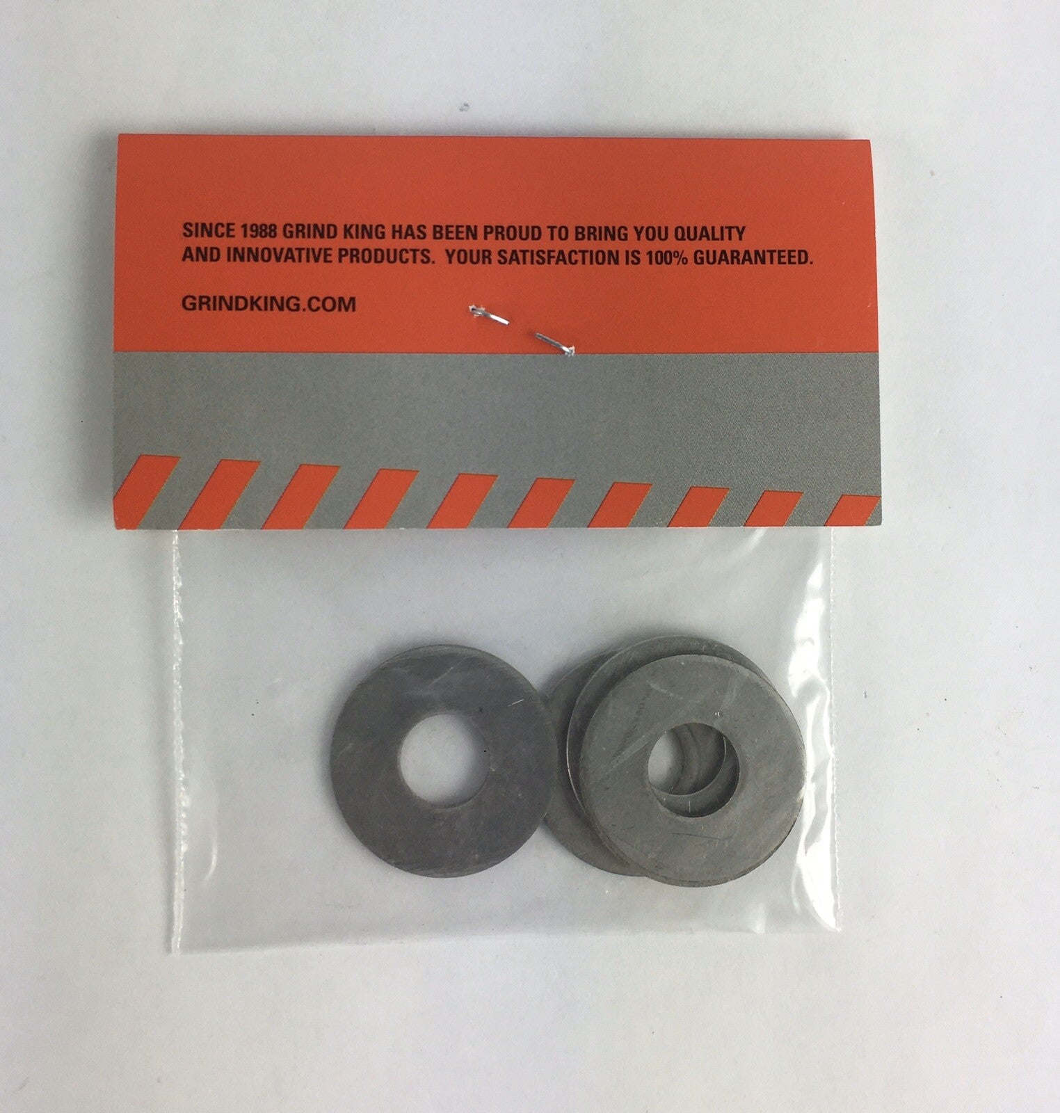 Grind King aluminum alloy flat cup washers for skateboard and longboard truck bushings and hardware replacement.