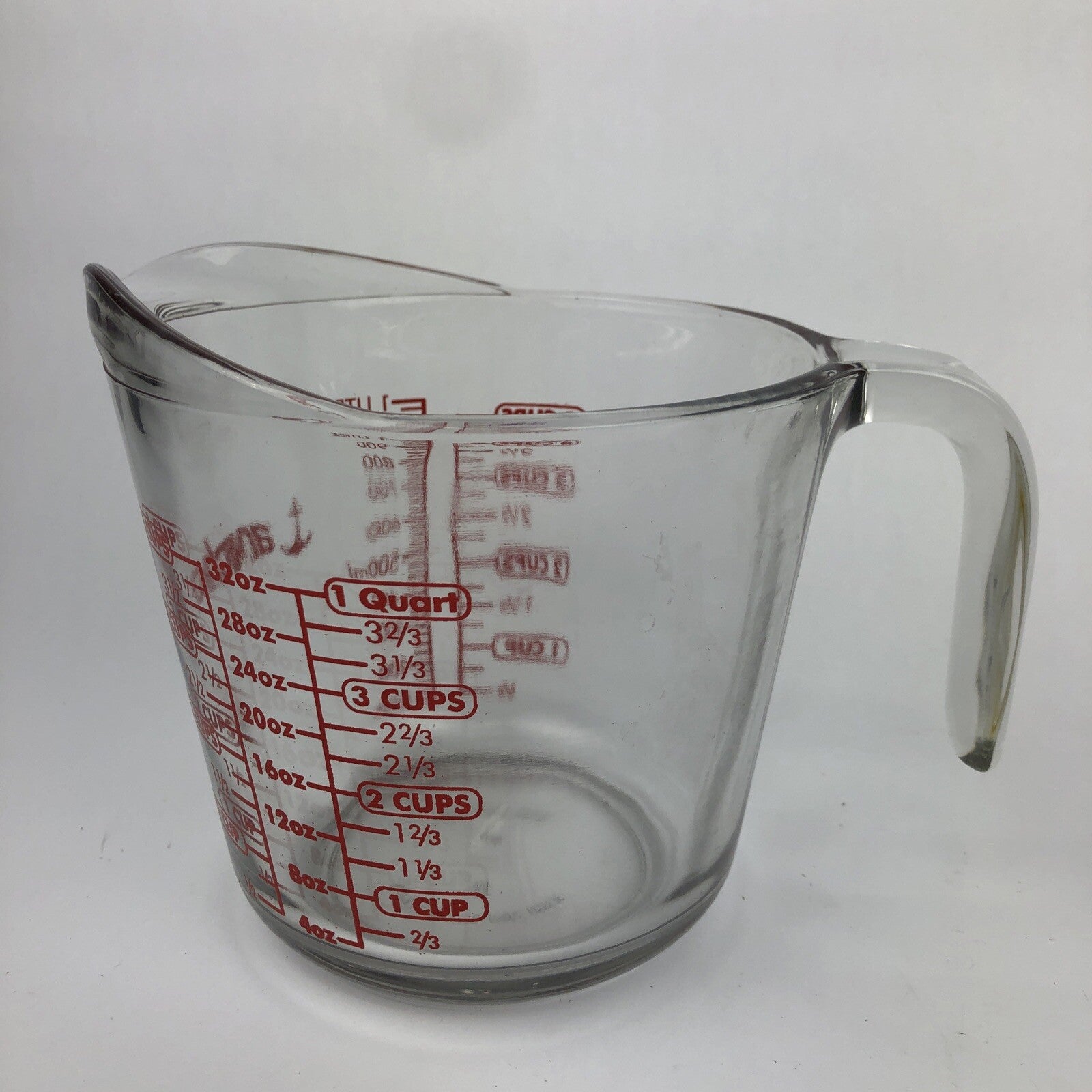 Anchor Hocking USA made 4 cup 1 quart glass measuring cup with red lettering.