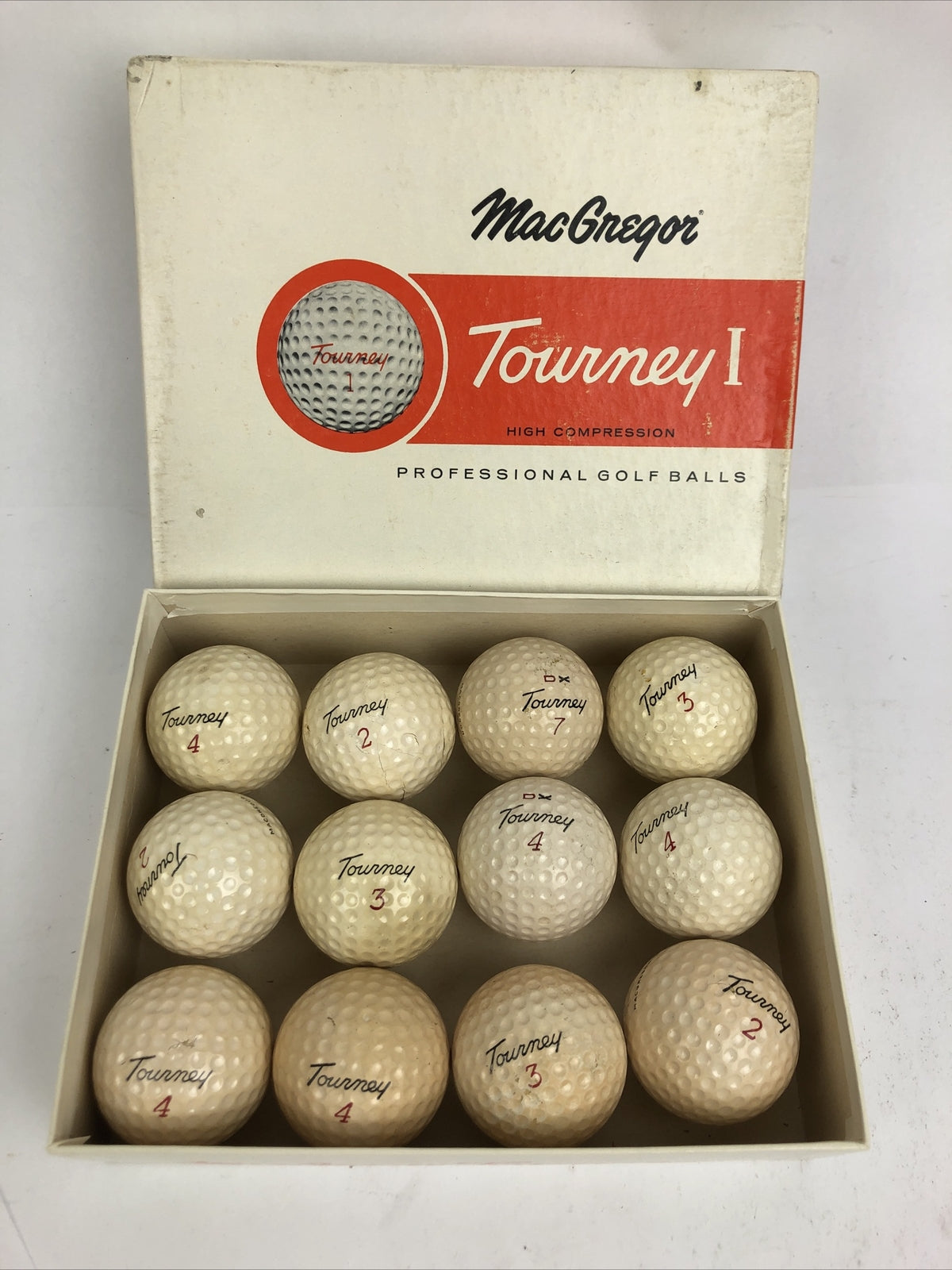 Vintage original dozen MacGregor Tourney I DX assorted professional golf balls collectible set