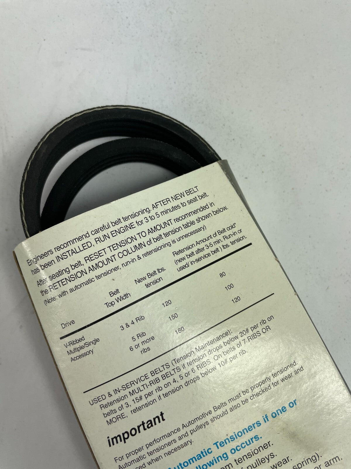 Dayco Drive Rite 5040385DR 4PK0980 belt tensioner OEM replacement serpentine belt system component.