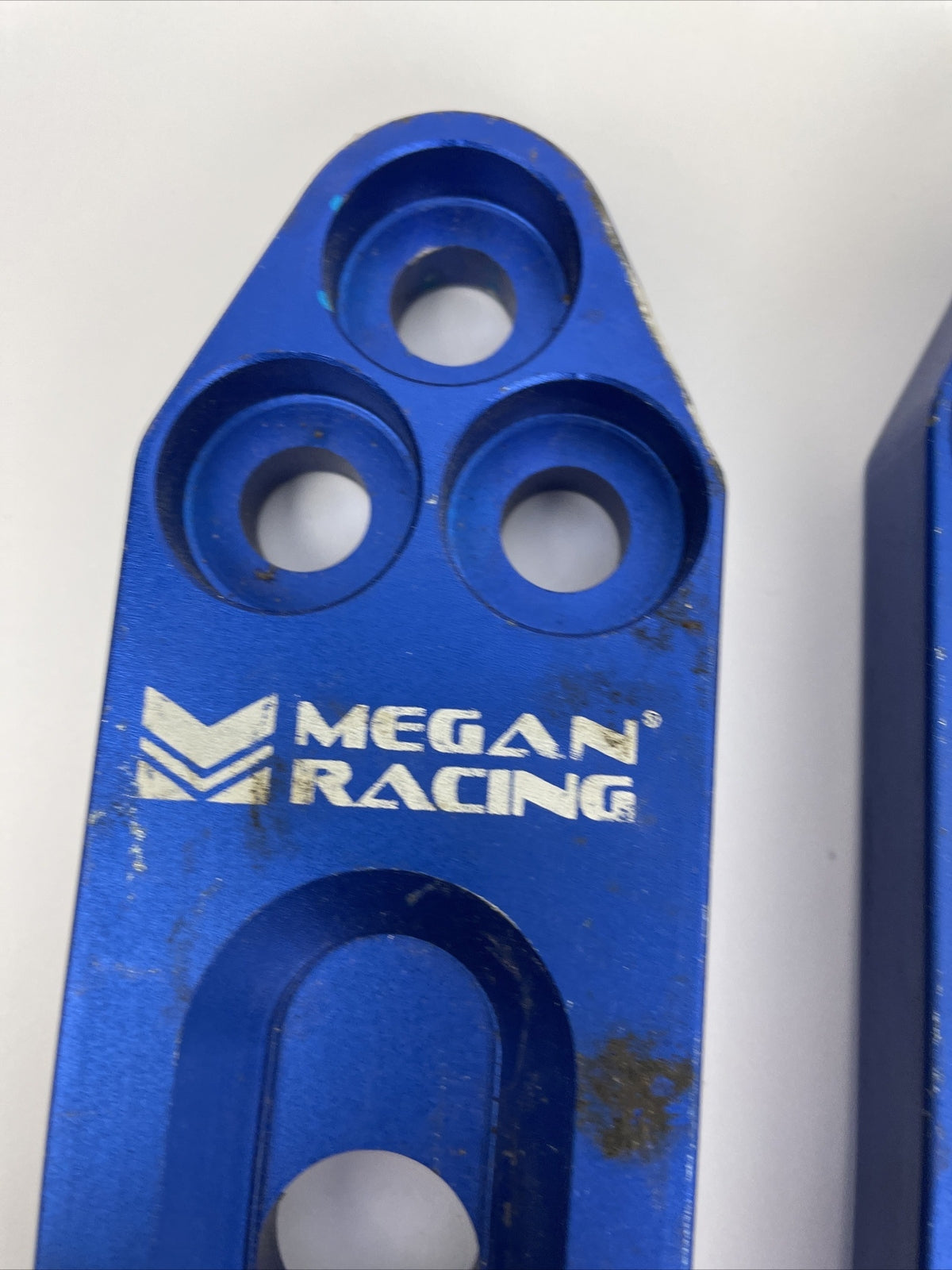 Megan Racing rear control arm bar blue