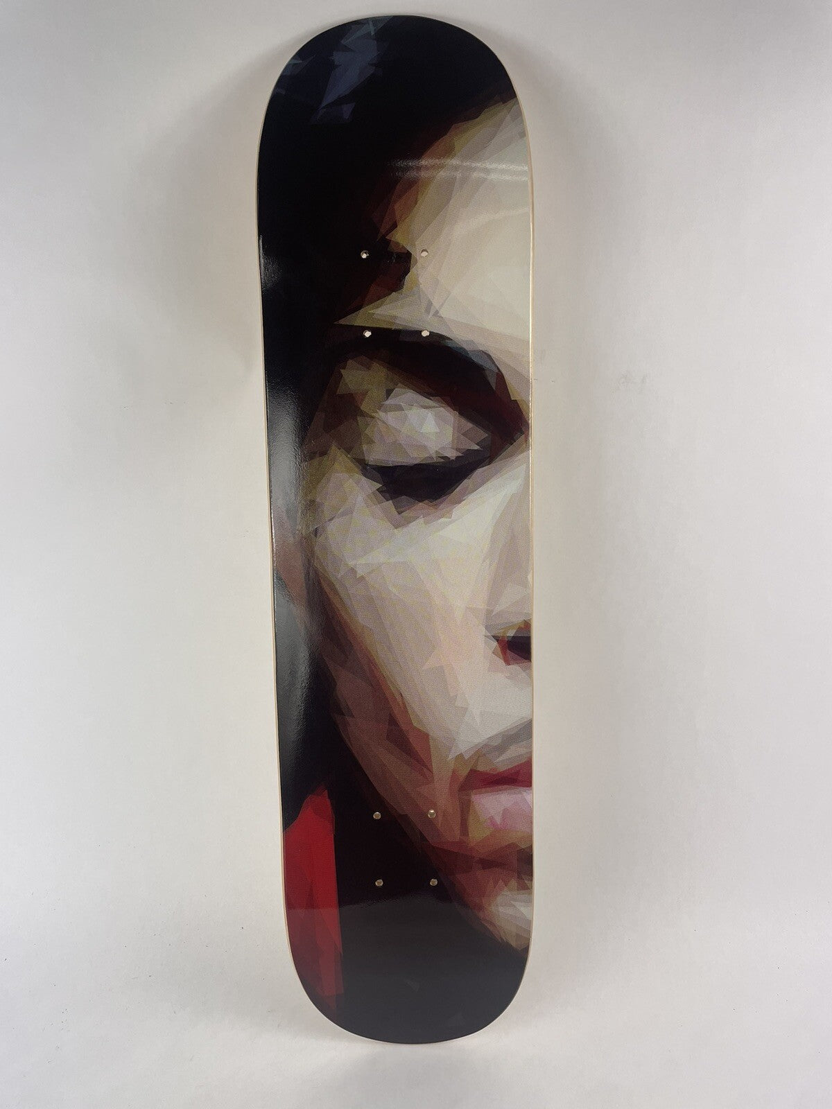Rare new 7.75-inch Prince-inspired art skateboard deck with premium 7-ply maple construction and collectible graphic.