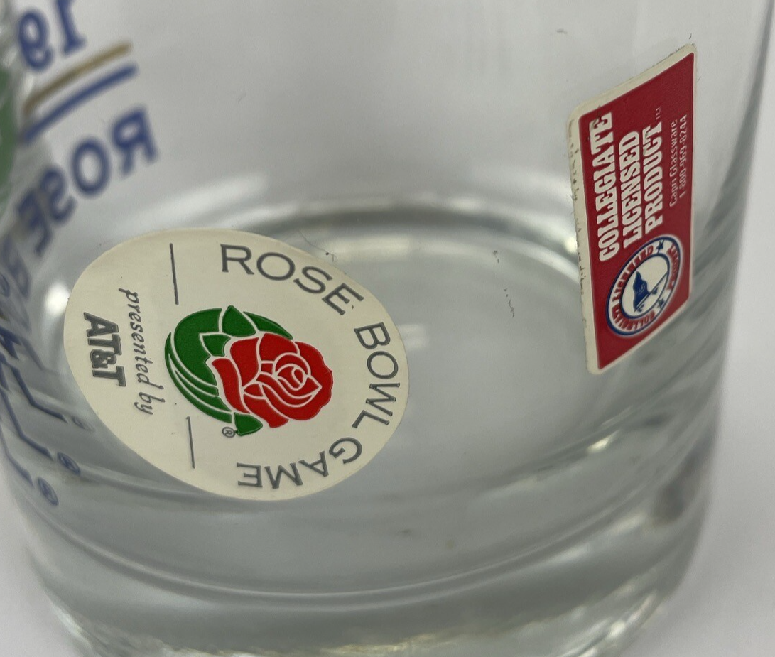 Set of two vintage UCLA Rose Bowl 1999 blue print bar glasses with gold trim.